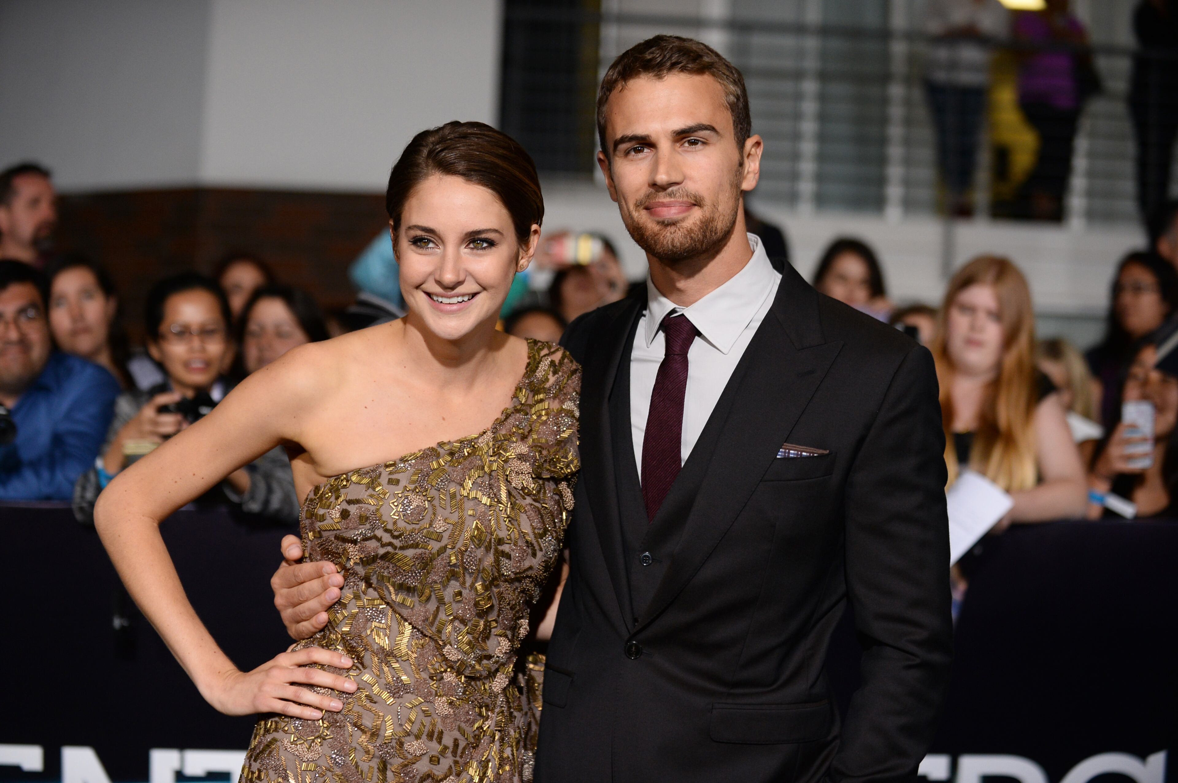 Shailene Woodley, left, and Theo James arrive at the world premiere of "Divergent" at the Westwood Regency Village Theater on Tuesday, March 18, 2014, in Los Angeles. (Photo by Jordan Strauss/Invision/AP)