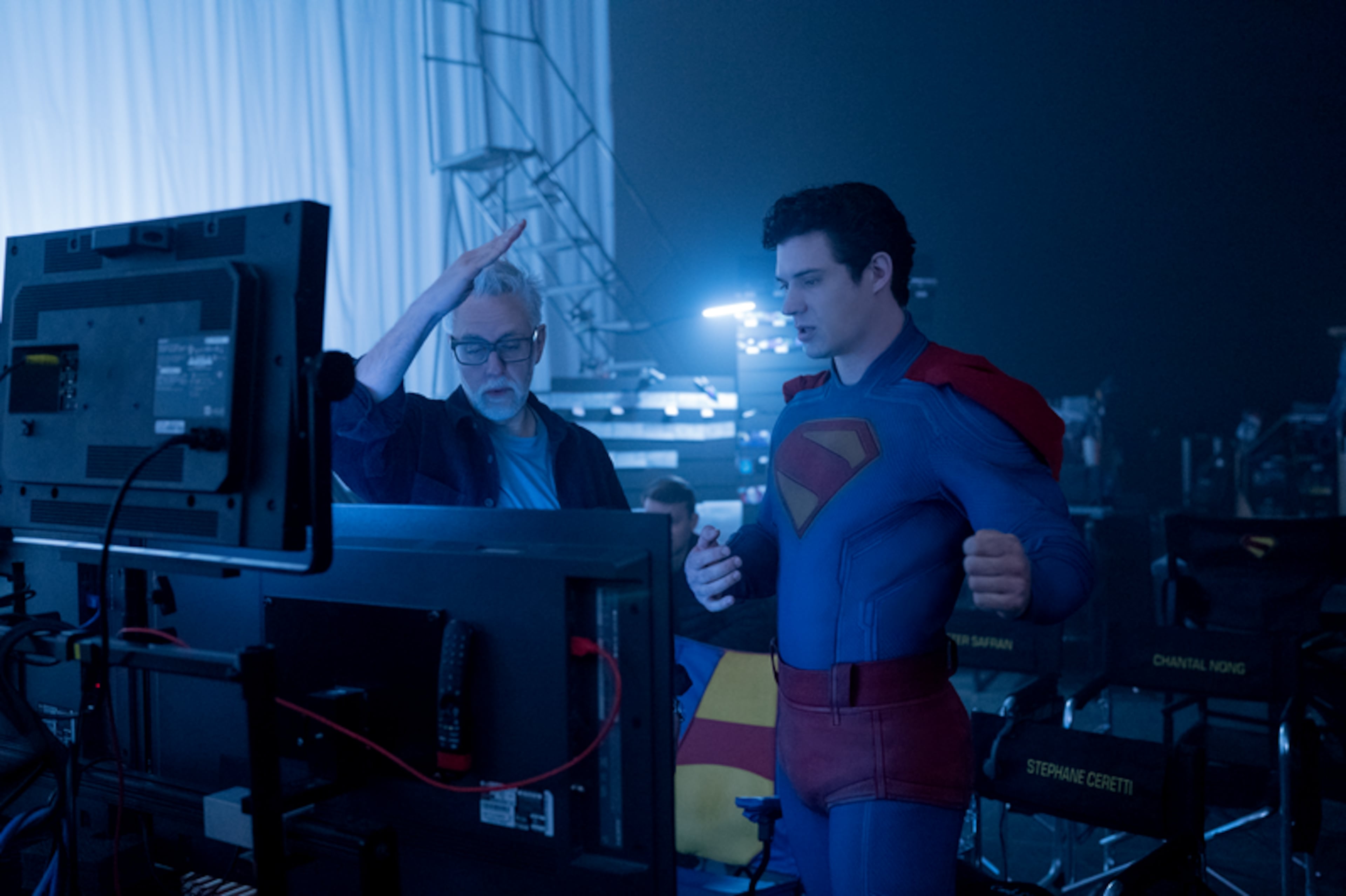 DC Studios co-CEO and "Superman" director James Gunn (center) works with David Corenswet during the filming of the 2025 movie. (Courtesy of Warner Brothers)