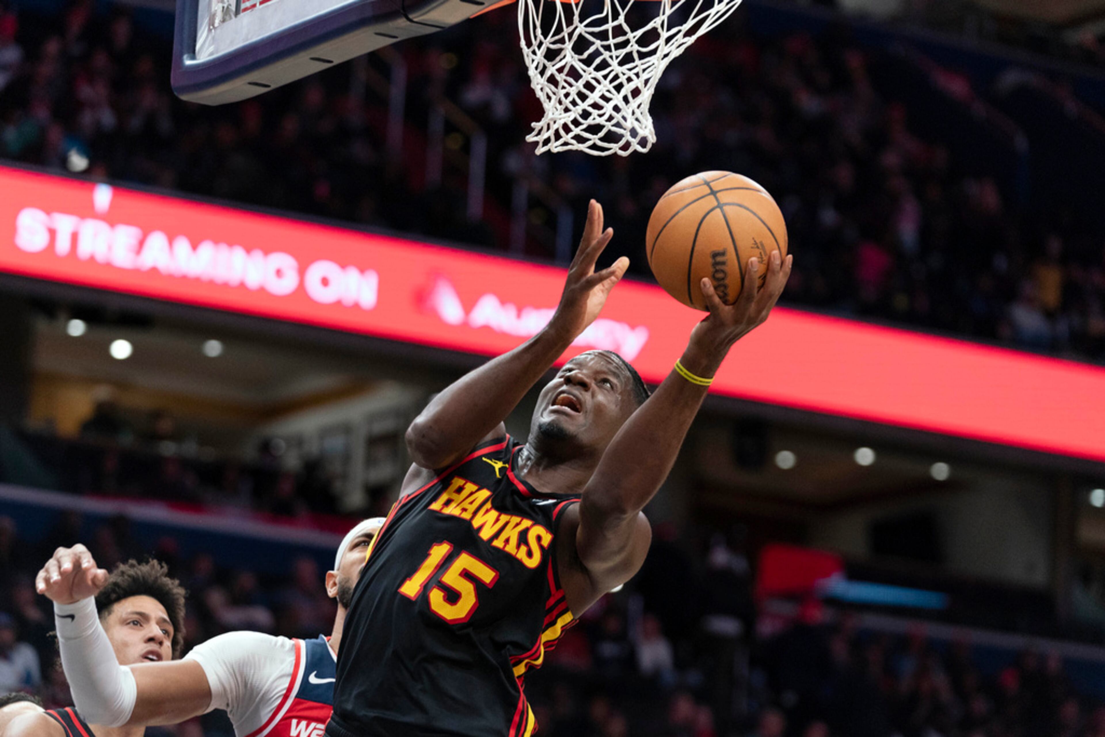 Atlanta Hawks' Clint Capela (15) goes for a basket against Washington Wizards during the second half of an NBA basketball game Sunday, Dec. 31, 2023, in Washington. (AP Photo/Jose Luis Magana)