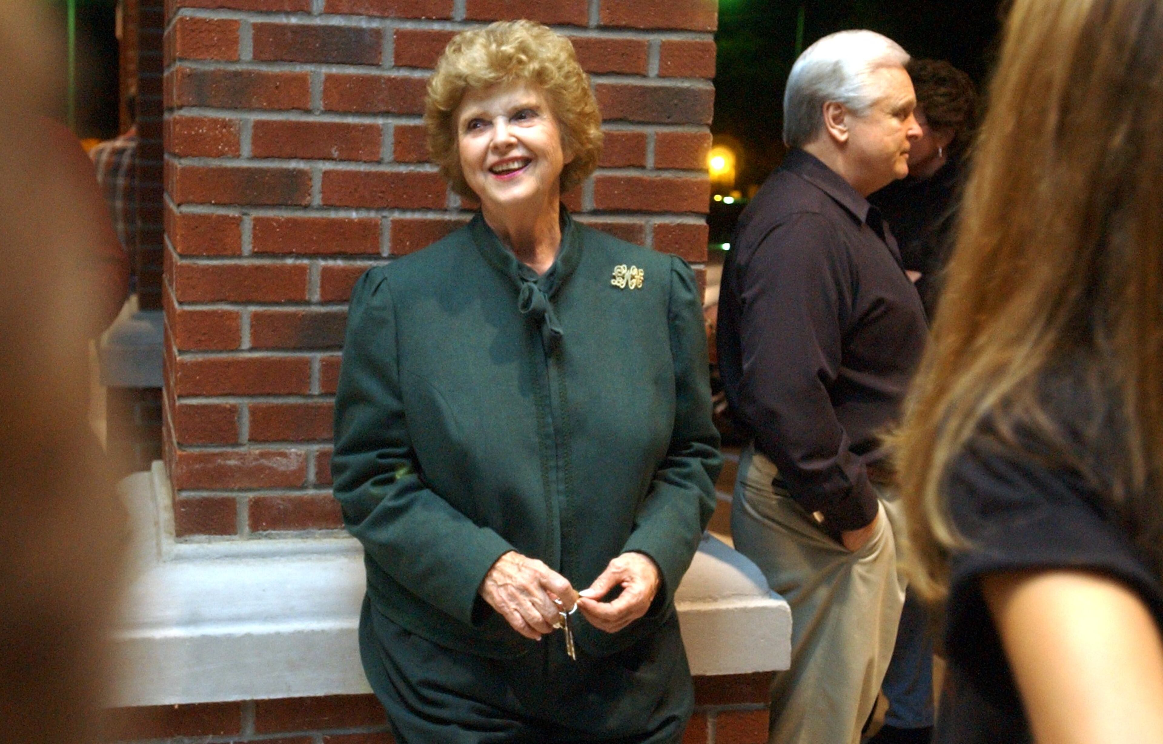 November 2003 -- Norcross Mayor Lillian Webb, center, relaxes with a big smile at Norcross City Hall after winning the Norcross mayoral race against Bill Barks. All told, Webb led the city for 11 terms. -- Text by Bita Honarvar, AJC file, and Tyler Estep, AJC