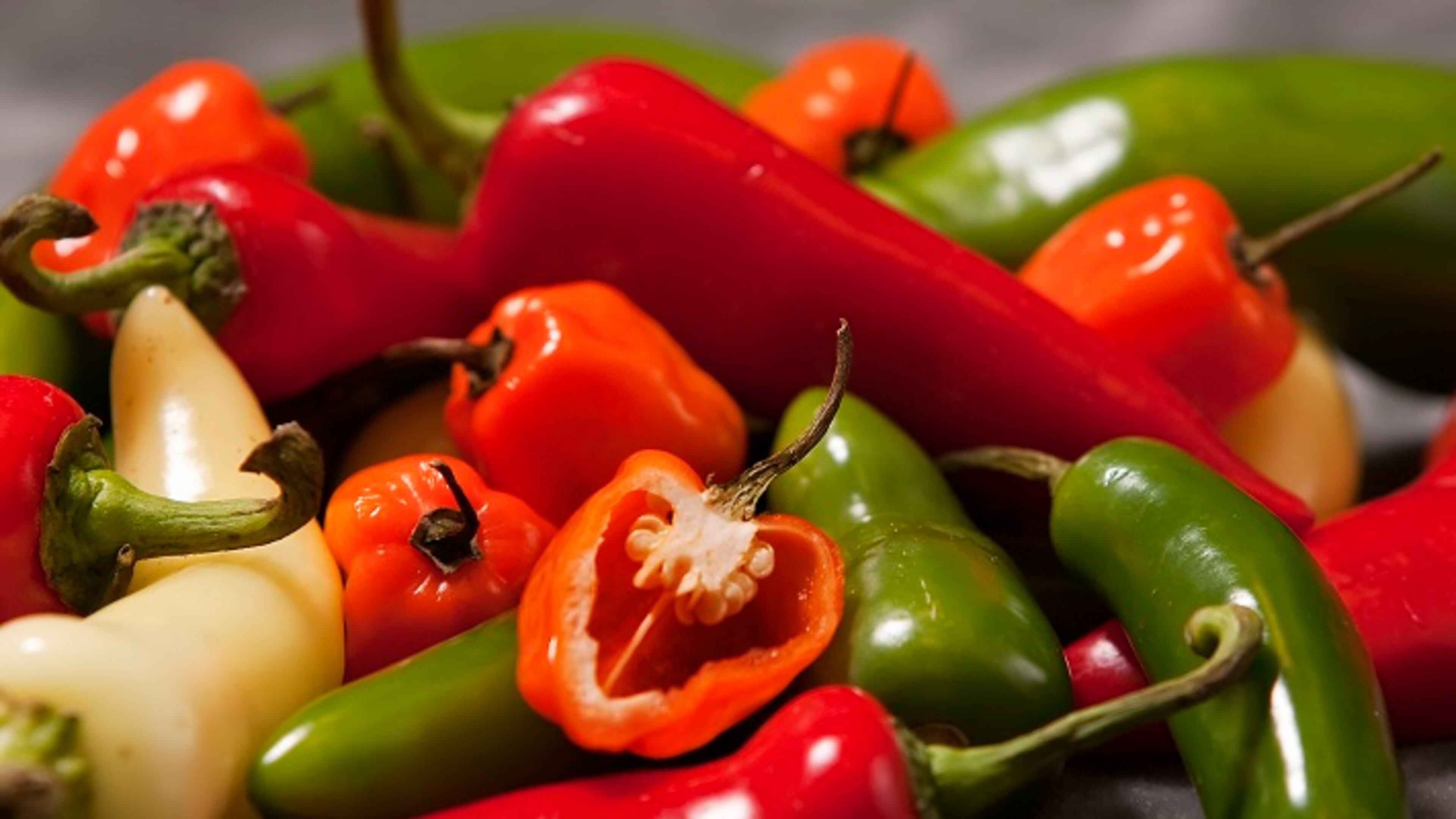 Bored with comfort food, Americans crave hot chili peppers, the hotter the better. "Benign masochism," a psychologist calls it. As in past recessions, chili sales are booming, making it the second most popular flavor, after chocolate (George Bridges/MCT)