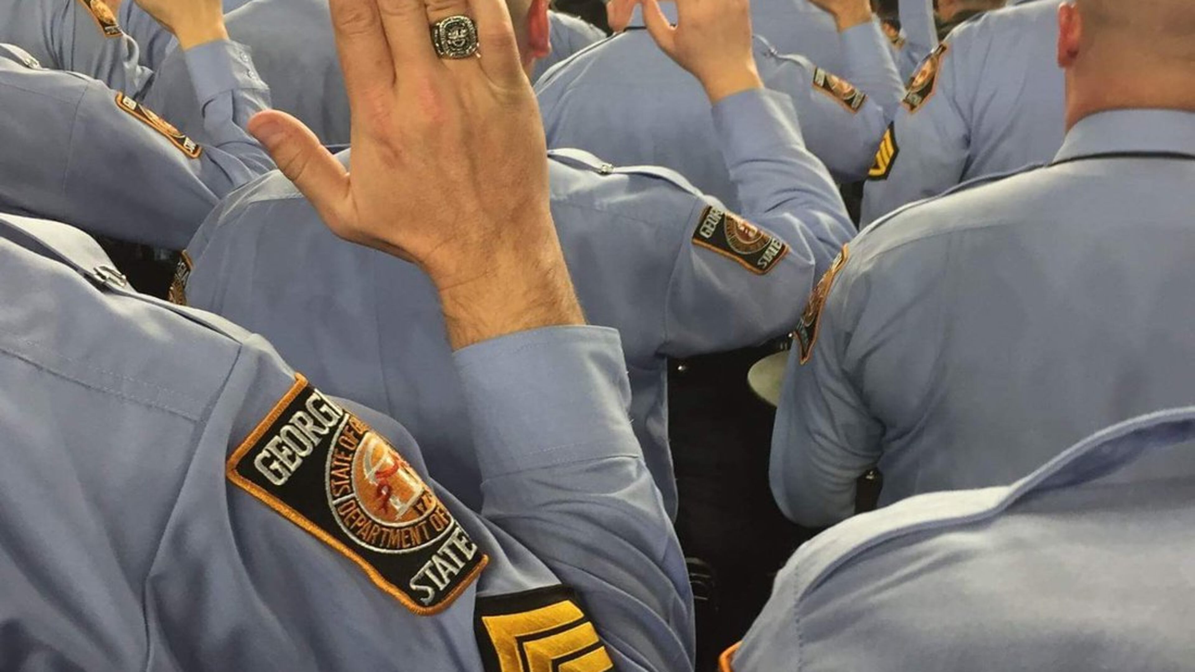 Georgia State Patrol officers are sworn in as deputy U.S. marshals on Thursday in Washington, D.C.