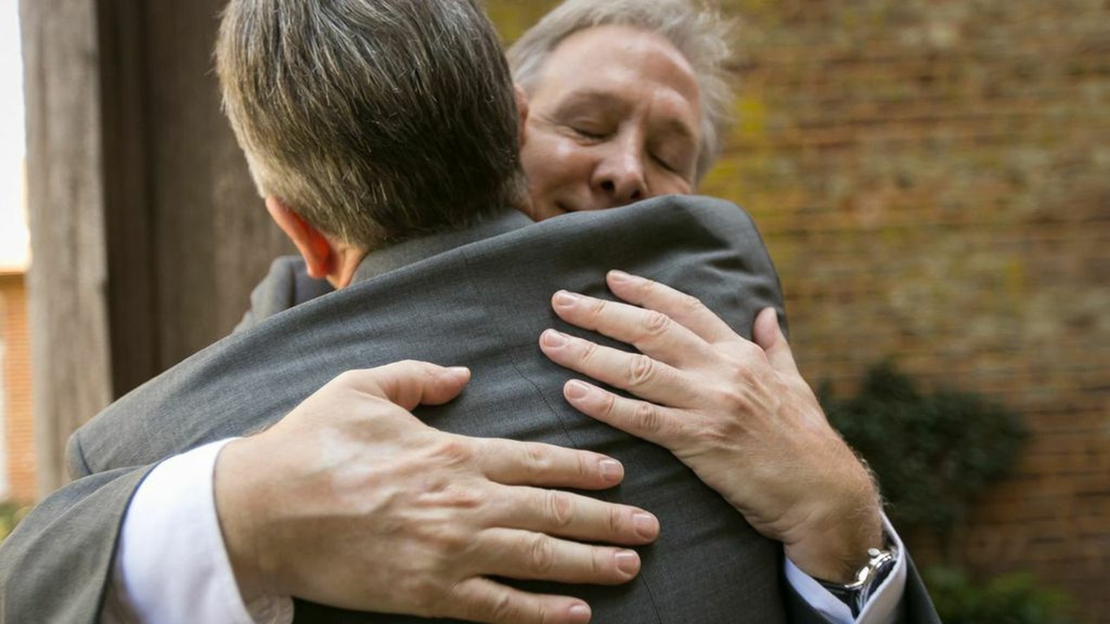 Atlanta real estate attorneys Joseph Henson and Robert Cook hug at Barnsley Gardens Resorts in Adairsville, Ga., in September 2014. They were legally married in Provincetown, Mass., in July 2014, but held another ceremony in Adairsville to share their union with family and friends. Georgia bans same-sex marriages. But a U.S. Supreme Court ruling due any day now in June 2015 could change that.