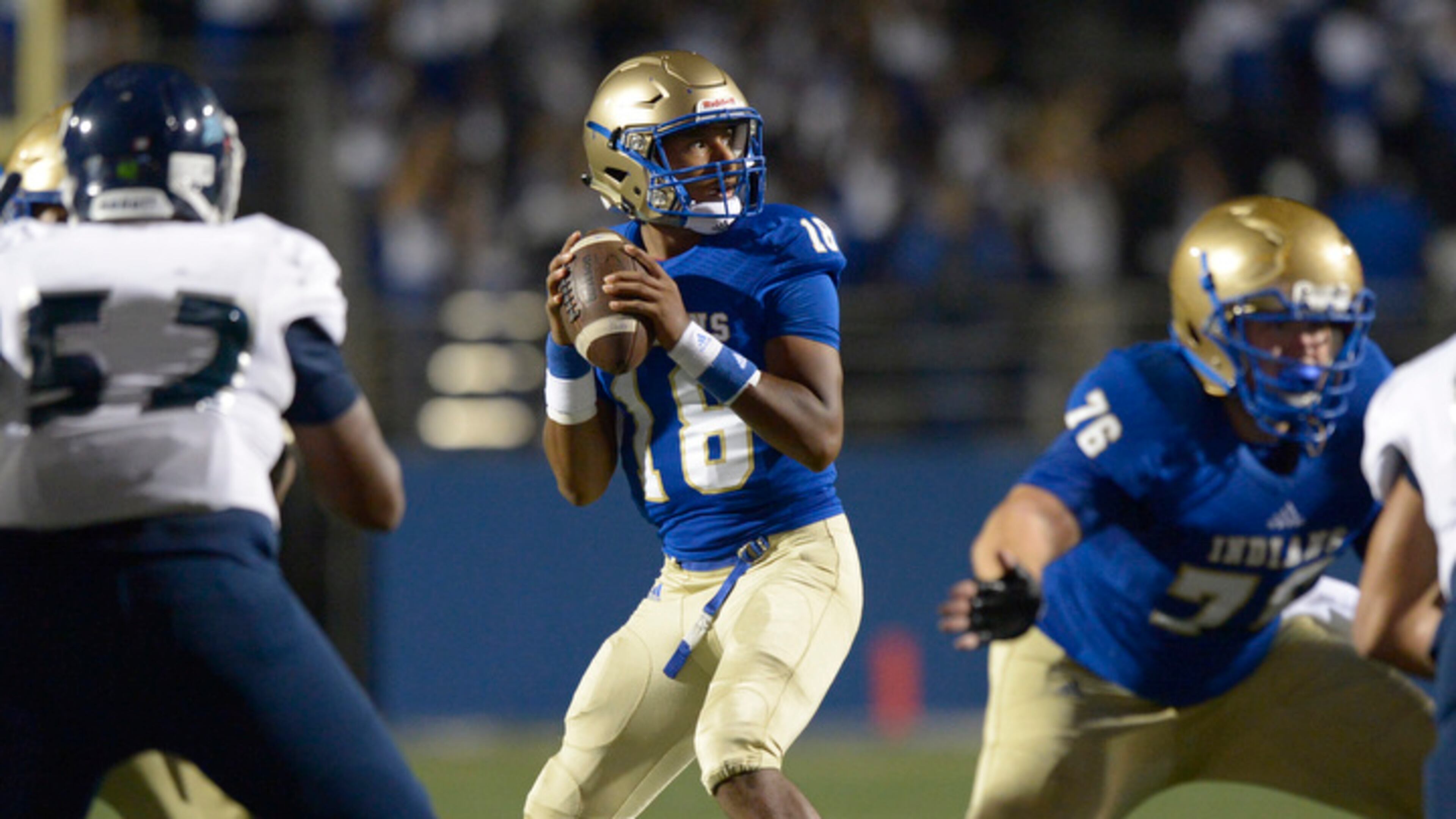 High School football: McEachern QB Carlos Del Rio (18) drops back to pass during the first half of Friday's home game against Cedar Grove. (Daniel Varnado/Special)