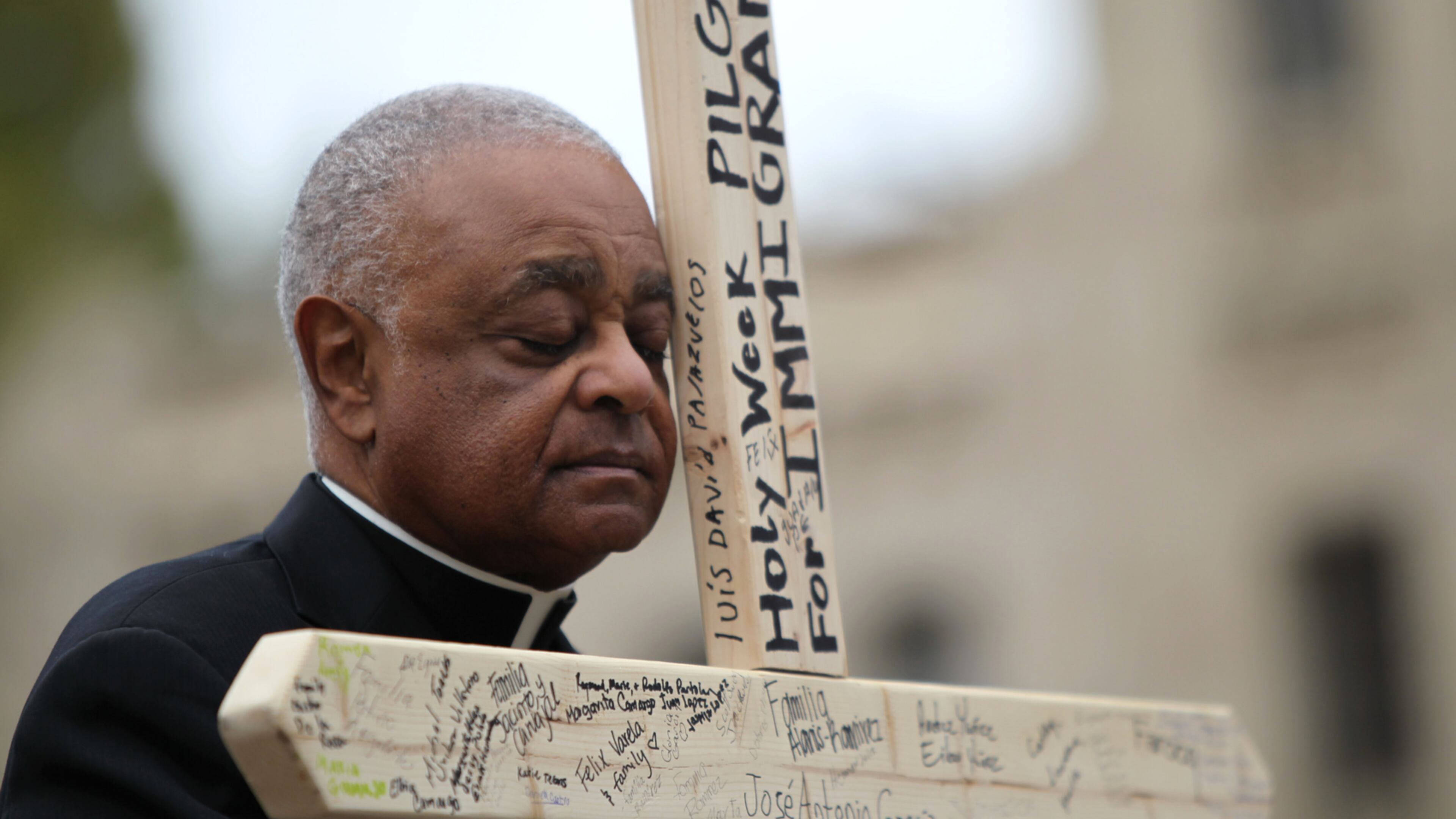 March 25, 2016 Atlanta - Archbishop Wilton D. Gregory
closes his eyes in prayer at the second station of the cross at Talmadge Park. Attendants commemorated the stations of the cross along the pilgrimage and reflected on issues at every station. TAYLOR CARPENTER / TAYLOR.CARPENTER@AJC.COM