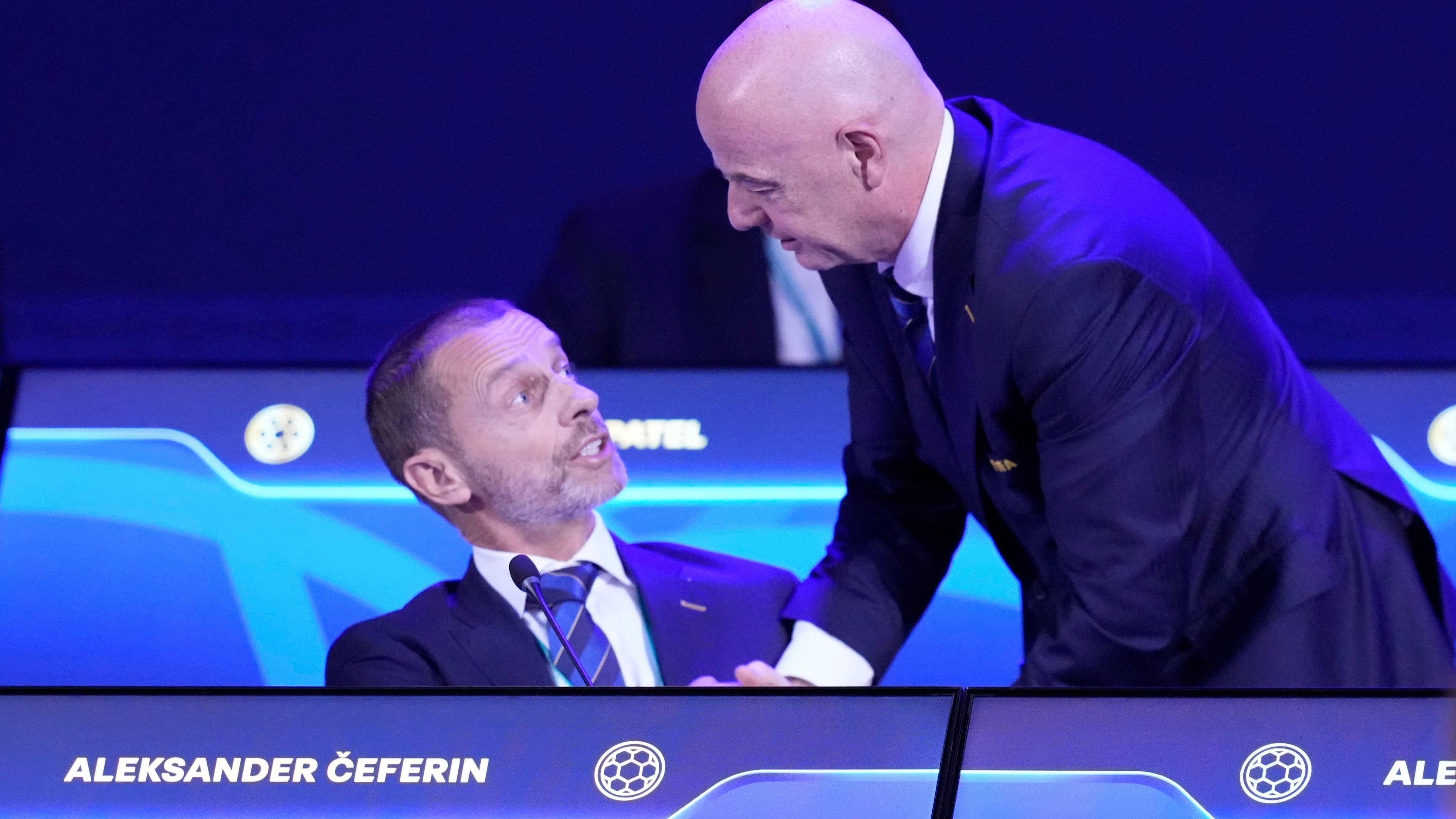 FILE - FIFA President Gianni Infantino, right, talks to UEFA President Aleksander Ceferin during the FIFA 75th Congress at the Conmebol Convention Center in Luque, Paraguay, Thursday, May 15, 2025. (AP Photo/Fernando Calistro, File)