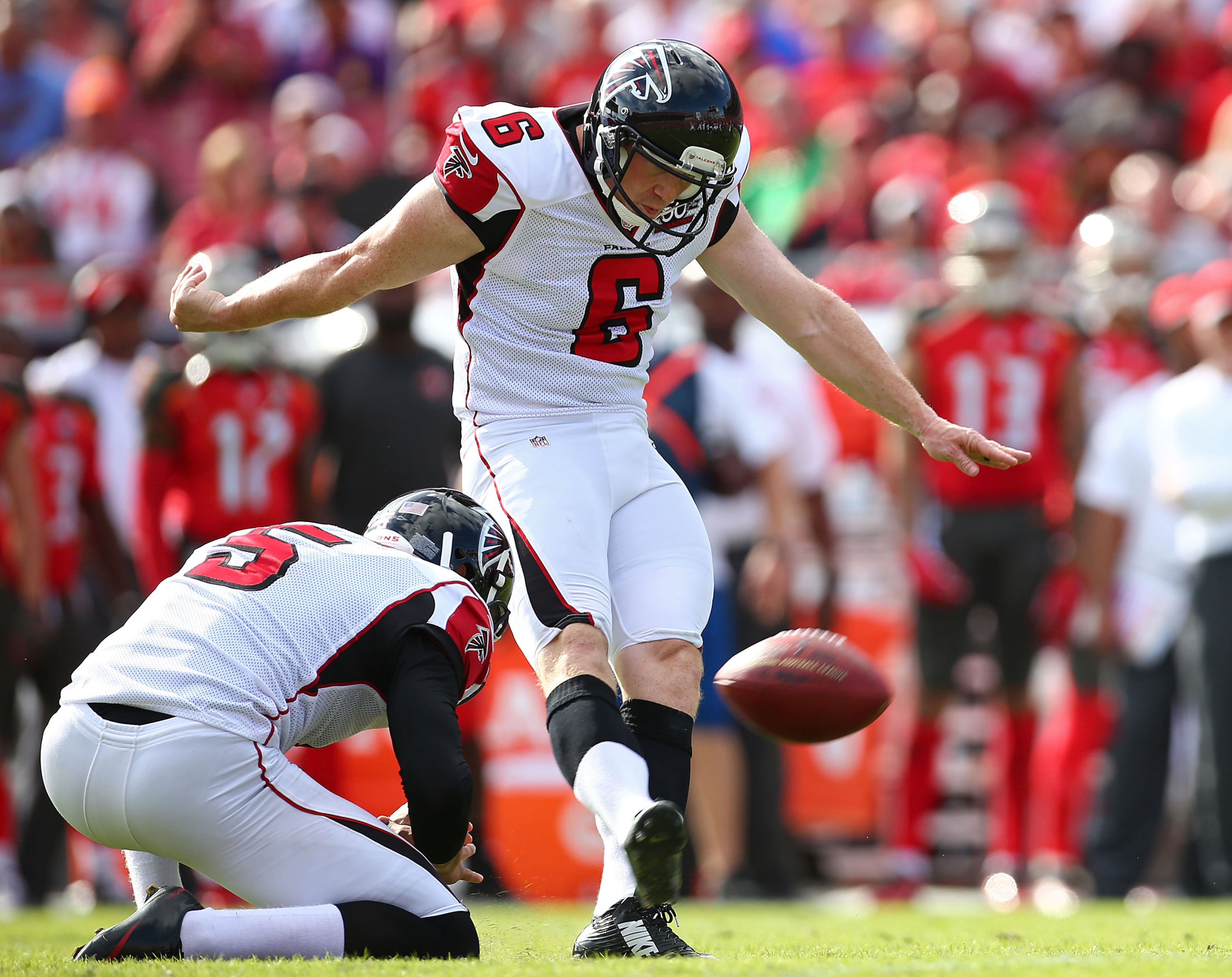 TAMPA, FL - DECEMBER 06: Shayne Graham #6 of the Atlanta Falcons kicks a field goal off a hold by Matt Bosher #5 during the second quarter of the game against the Tampa Bay Buccaneers at Raymond James Stadium on December 6, 2015 in Tampa, Florida. (Photo by Rob Foldy/Getty Images)