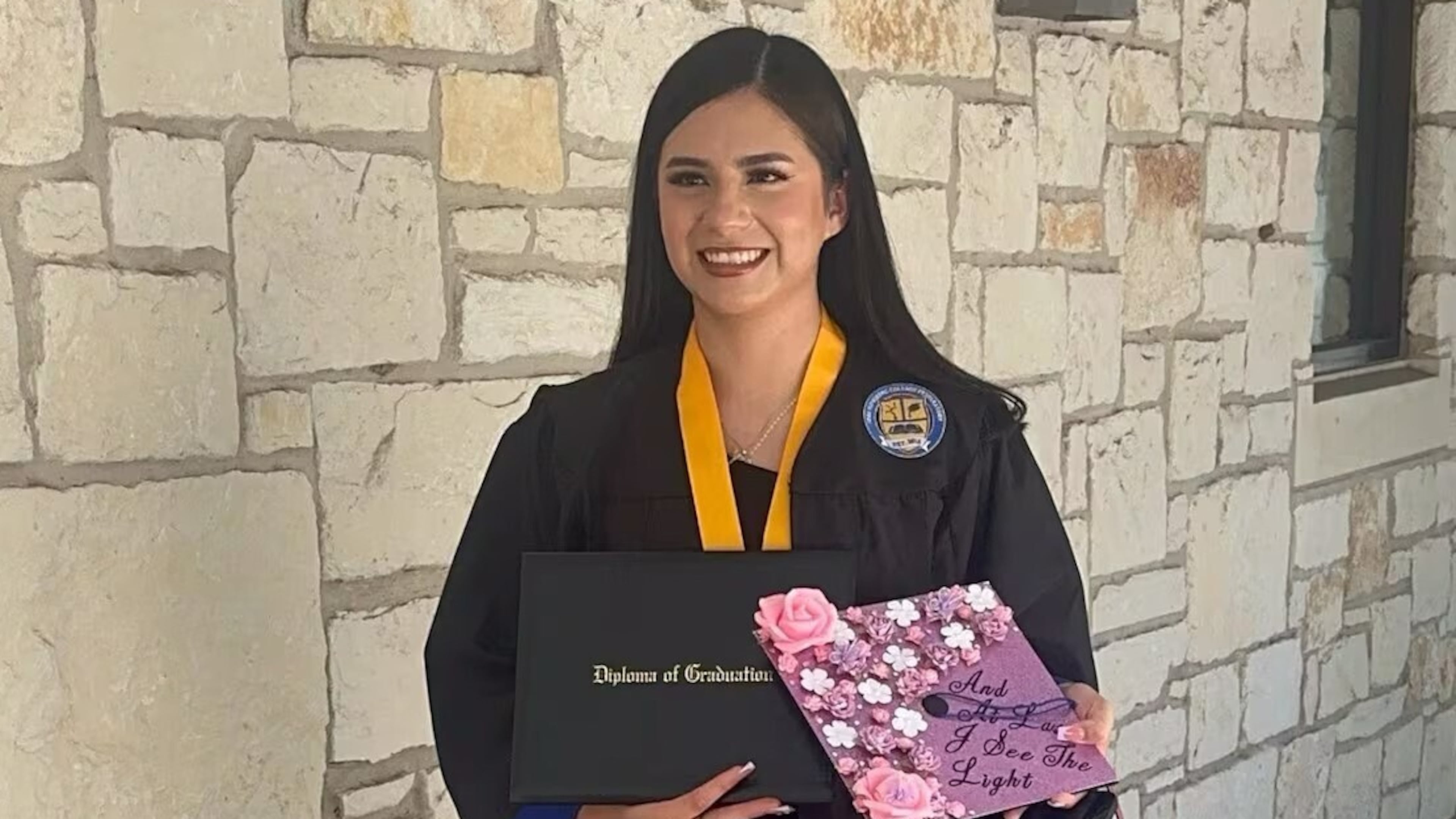 FILE - In this undated photo provided by her attorney, Todd Pomerleau, in January 2025, Any Lucia Lopez Belloza celebrates her high school graduation in Texas. (Any Lucia Lopez Belloza's attorney via AP, File)