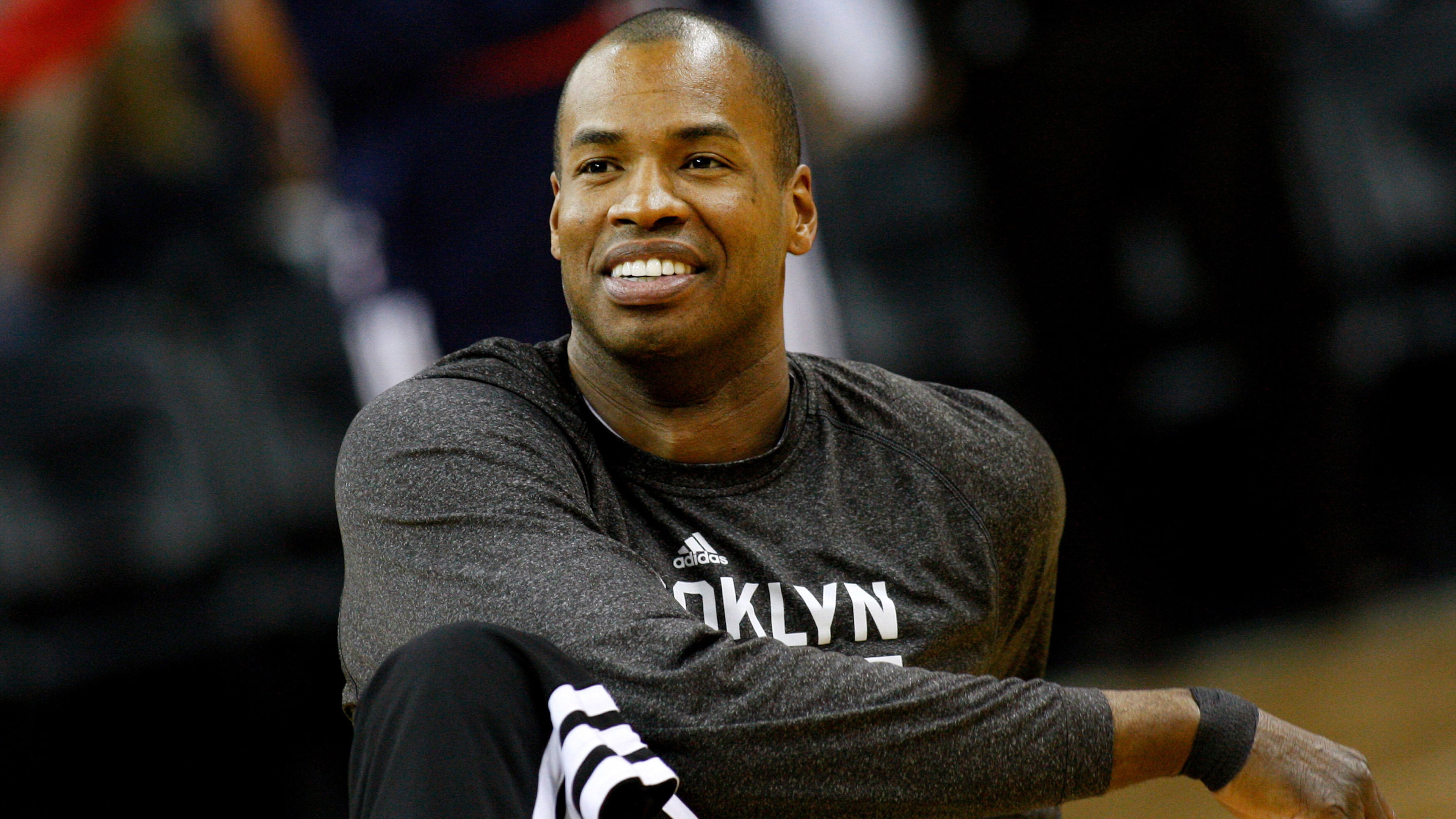FILE - Brooklyn Nets center Jason Collins warms up before an NBA basketball game in New Orleans, March 24, 2014. (AP Photo/Jonathan Bachman, File)