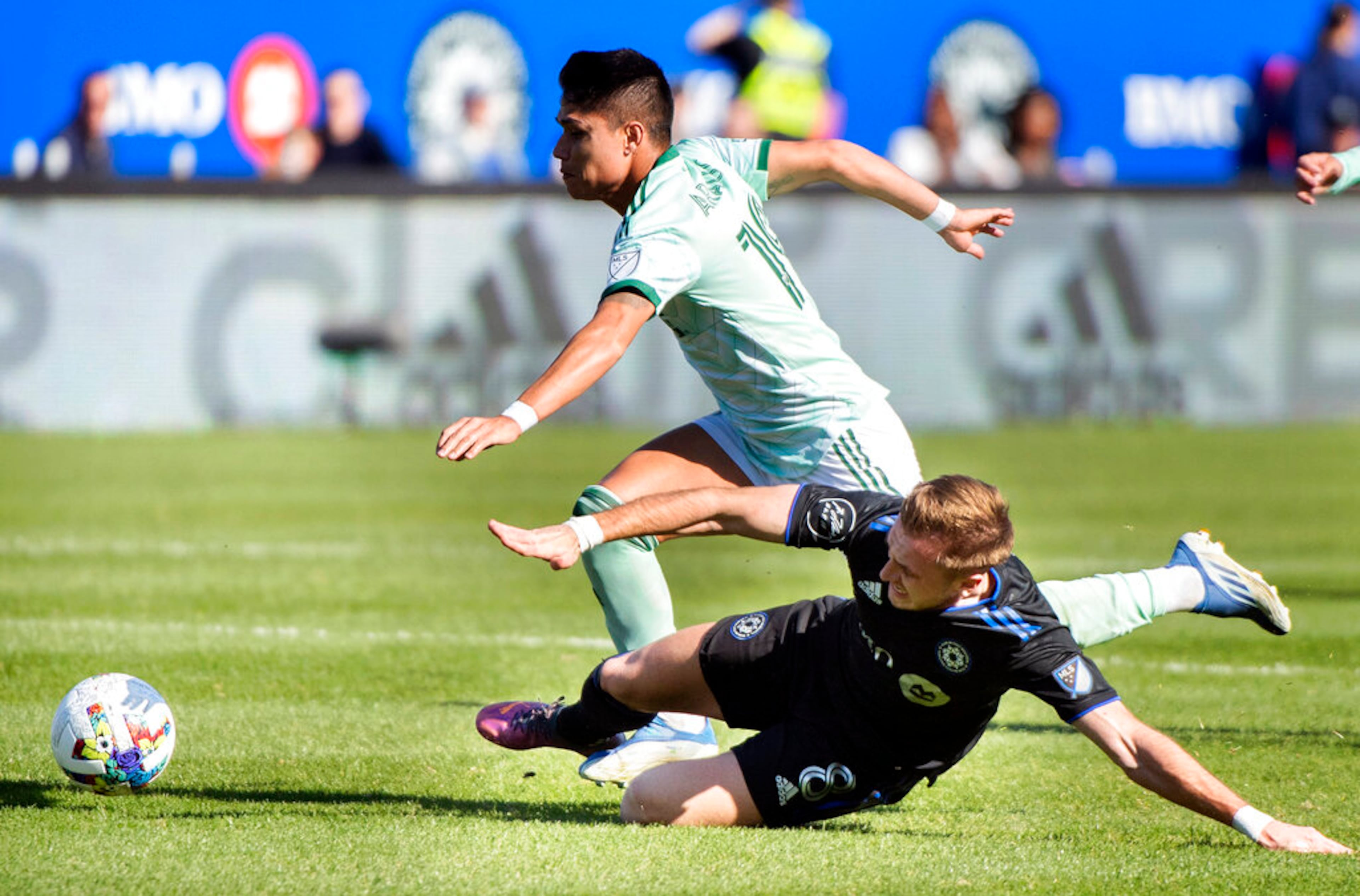 CF Montreal's Djordje Mihailovic, right, challenges Atlanta United's Luiz De Araujo during the first half of a MLS soccer game in Montreal, Saturday, April 30, 2022. Montreal won 2-1. (Graham Hughes/The Canadian Press via AP)