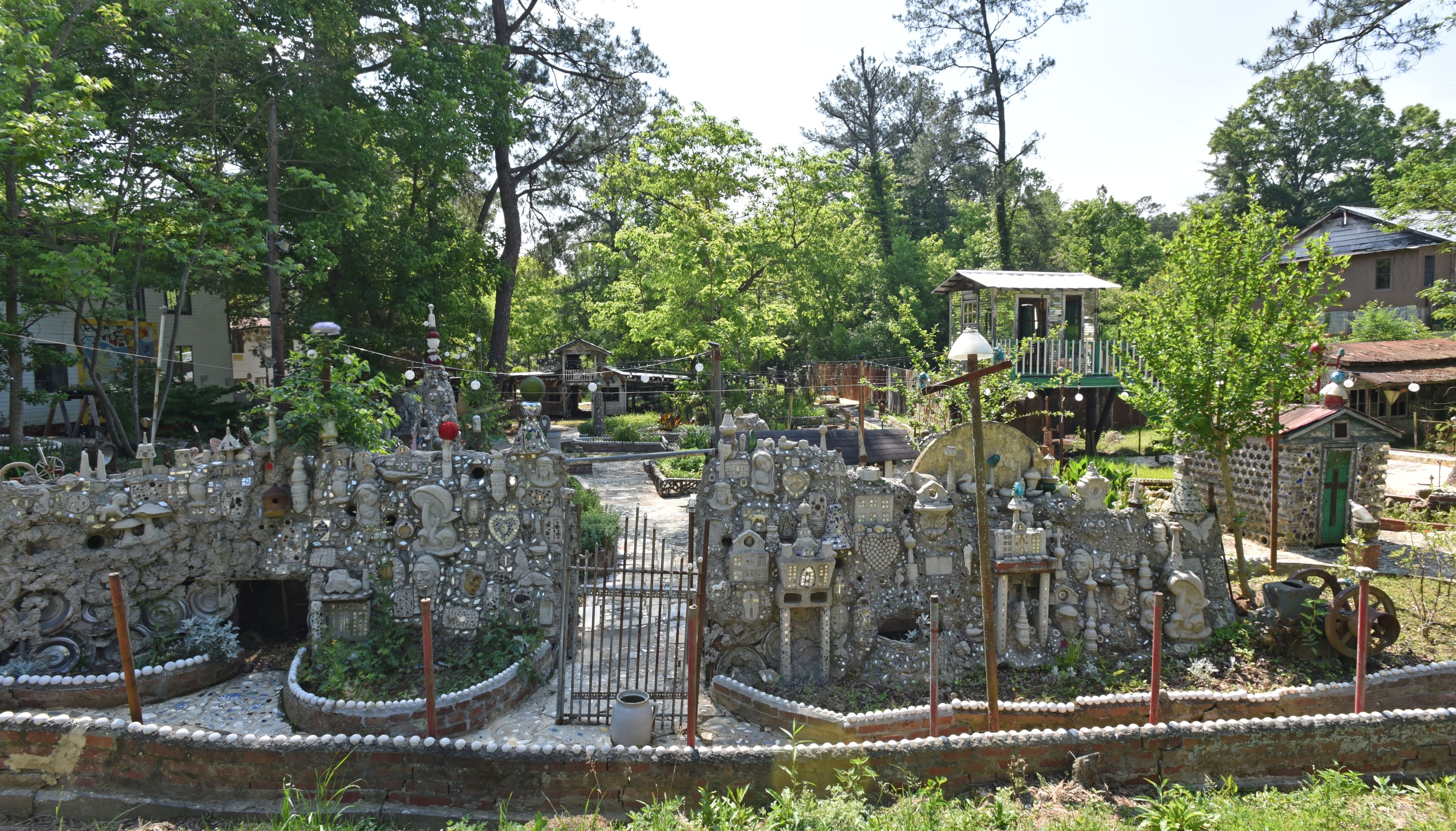 May 9, 2015 Summerville - Picture shows the Mosaic Garden area of folk artist Howard Finster's Paradise Garden in Summerville on Saturday, May 9, 2015. Famous folk artist Howard Finster began creating Paradise Gardens in 1961. It is listed as one of Georgia's noted art attractions. Finster's outsider art -- sculpture and paintings -- draws tourists from around the world. In advance of Finster Fest, May 30-31 in the northwest Georgia town of Summerville. Georgia's most famed folk artist, Finster was known as a great American eccentric, and plenty of eccentric places survive him in this gritty corner of the state. HYOSUB SHIN / HSHIN@AJC.COM