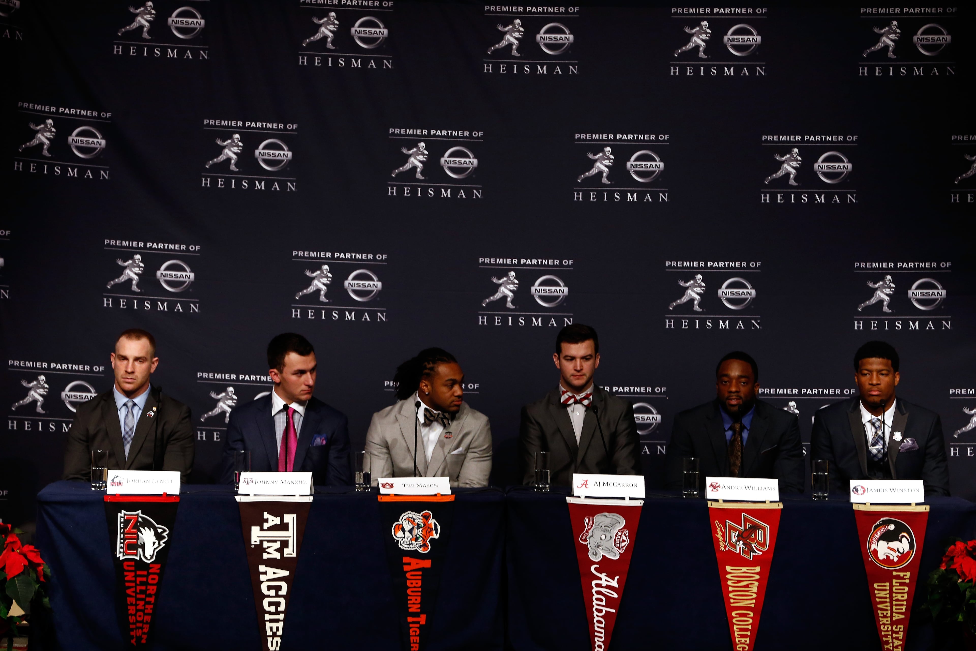 NEW YORK, NY - DECEMBER 14: (L-R) Jordan Lynch, quarterback of the Northern Illinios Huskies, Johnny Manziel, quarterback of the Texas A&M aggies, Tre Mason, running back for the Auburn University Tigers, AJ McCarron of the Alabama Crimson Tide, Andre Williams, quarterback of the Boston College Eagles, and Jameis Winston, quarterback of the Florida State Seminoles, speak to the media during a press conference prior to the 2013 Heisman Trophy Presentation at the Marriott Marquis on December 14, 2013 in New York City. (Photo by Jeff Zelevansky/Getty Images)