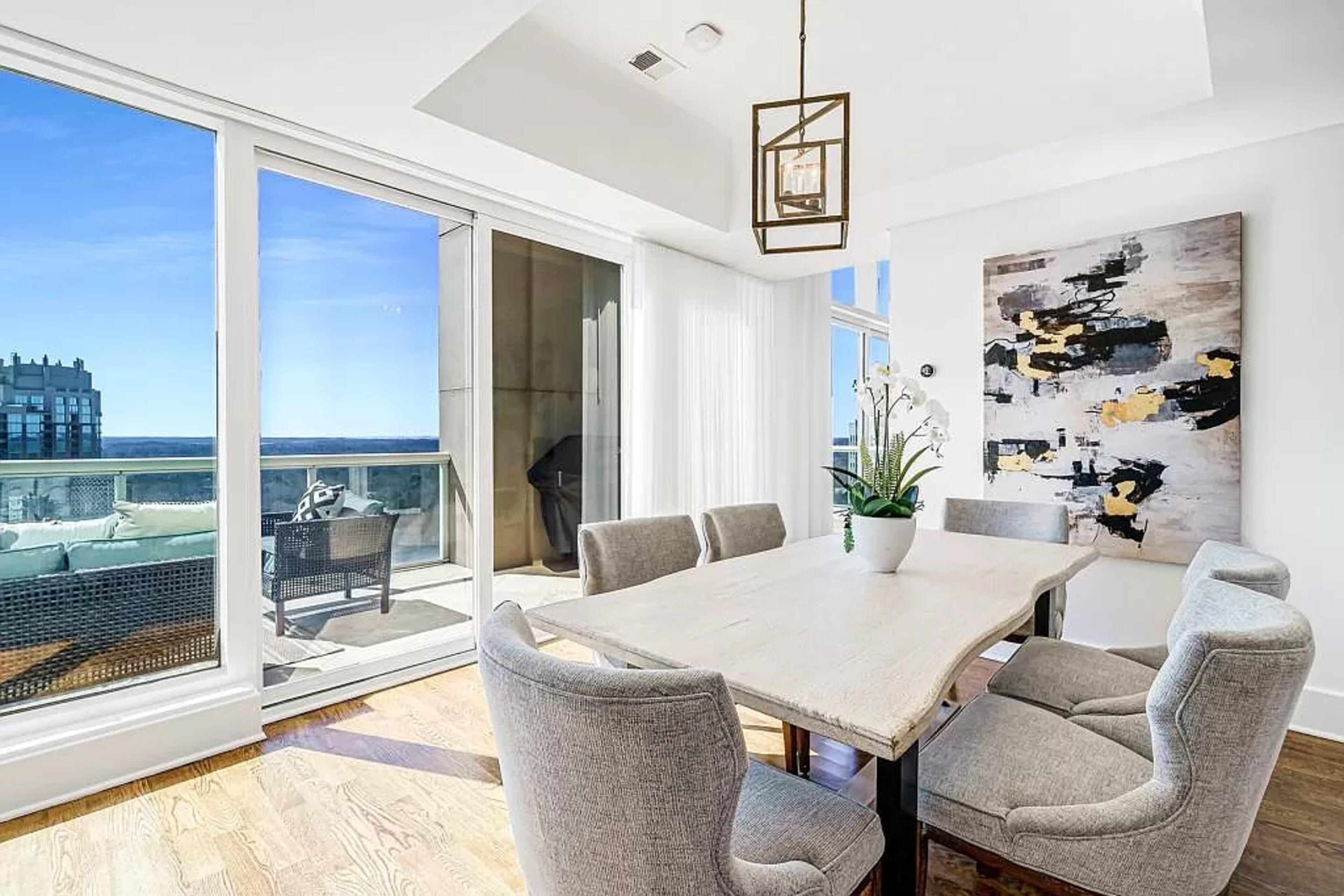 The kitchen overlooks the casual dining area, an inviting family room and a second covered terrace.
