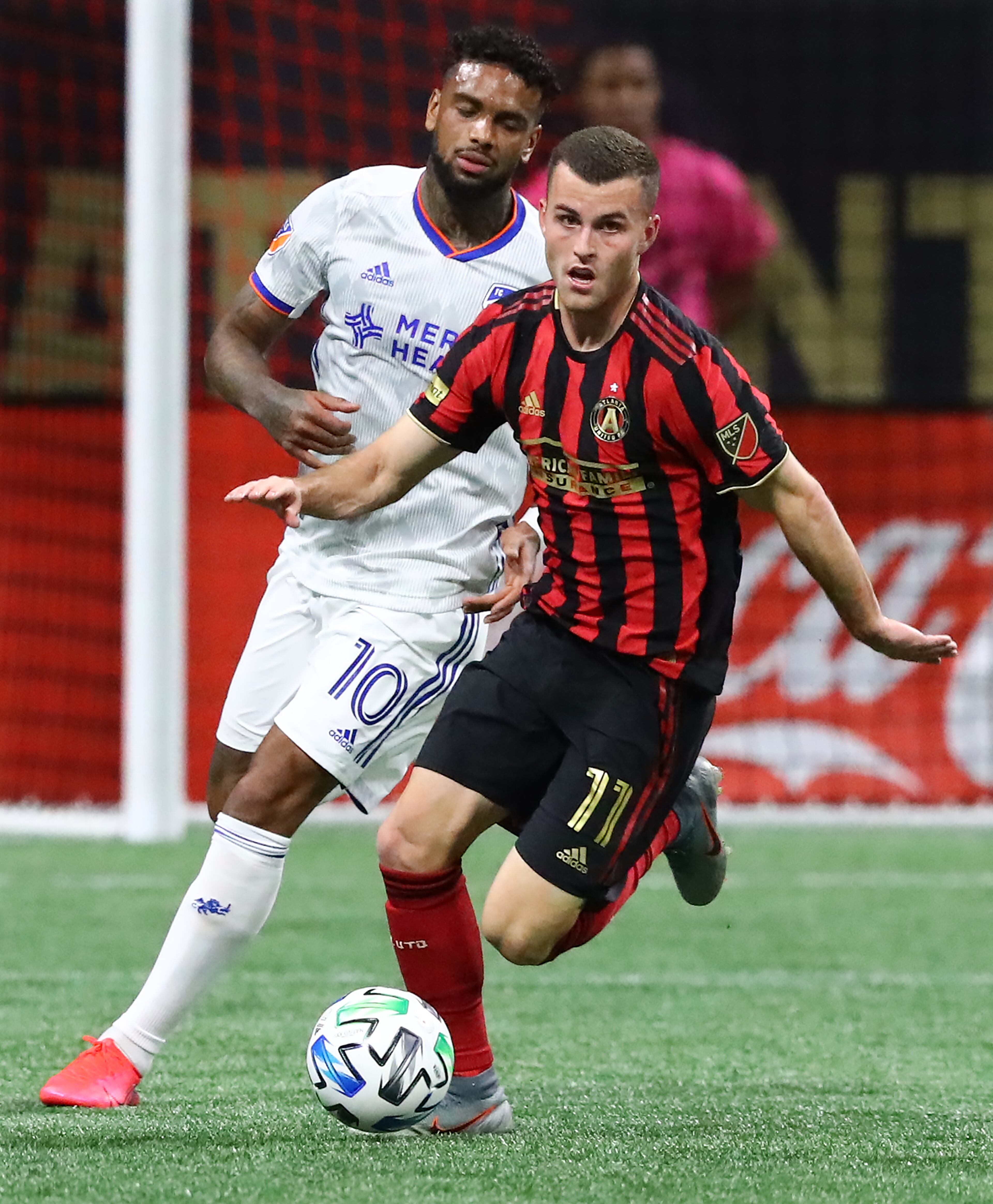 March 8, 2020 Atlanta: Atlanta United defender Brooks Lennon works against FC Cincinnati Juergen Locadia in a MLS soccer match on Saturday, March 8, 2020, in Atlanta. Curtis Compton ccompton@ajc.com