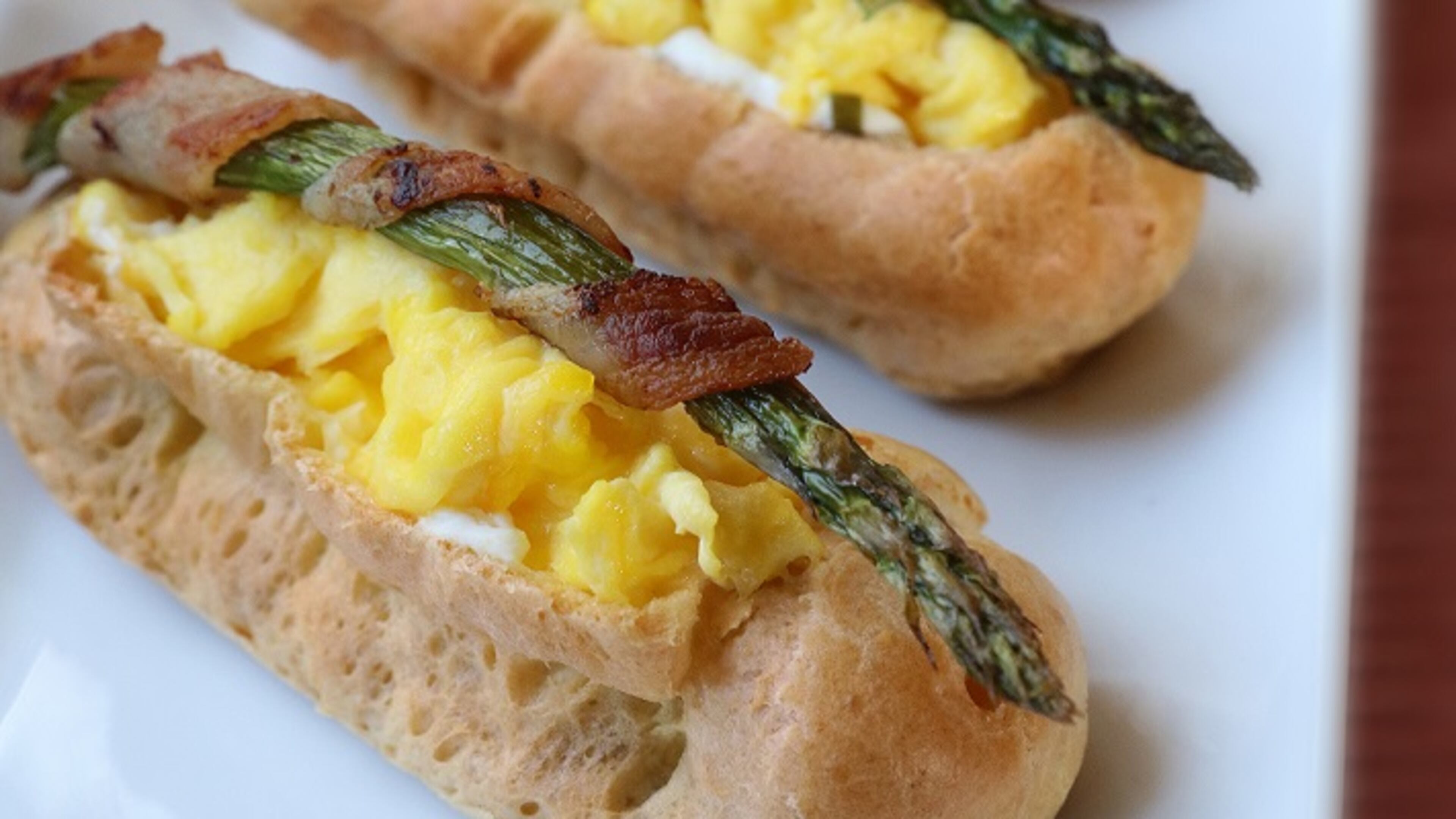 Bring something new to the Easter brunch table with savory eclairs filled with scrambled eggs and a selection of accompaniments. (Tom Wallace/Minneapolis Star Tribune/TNS)