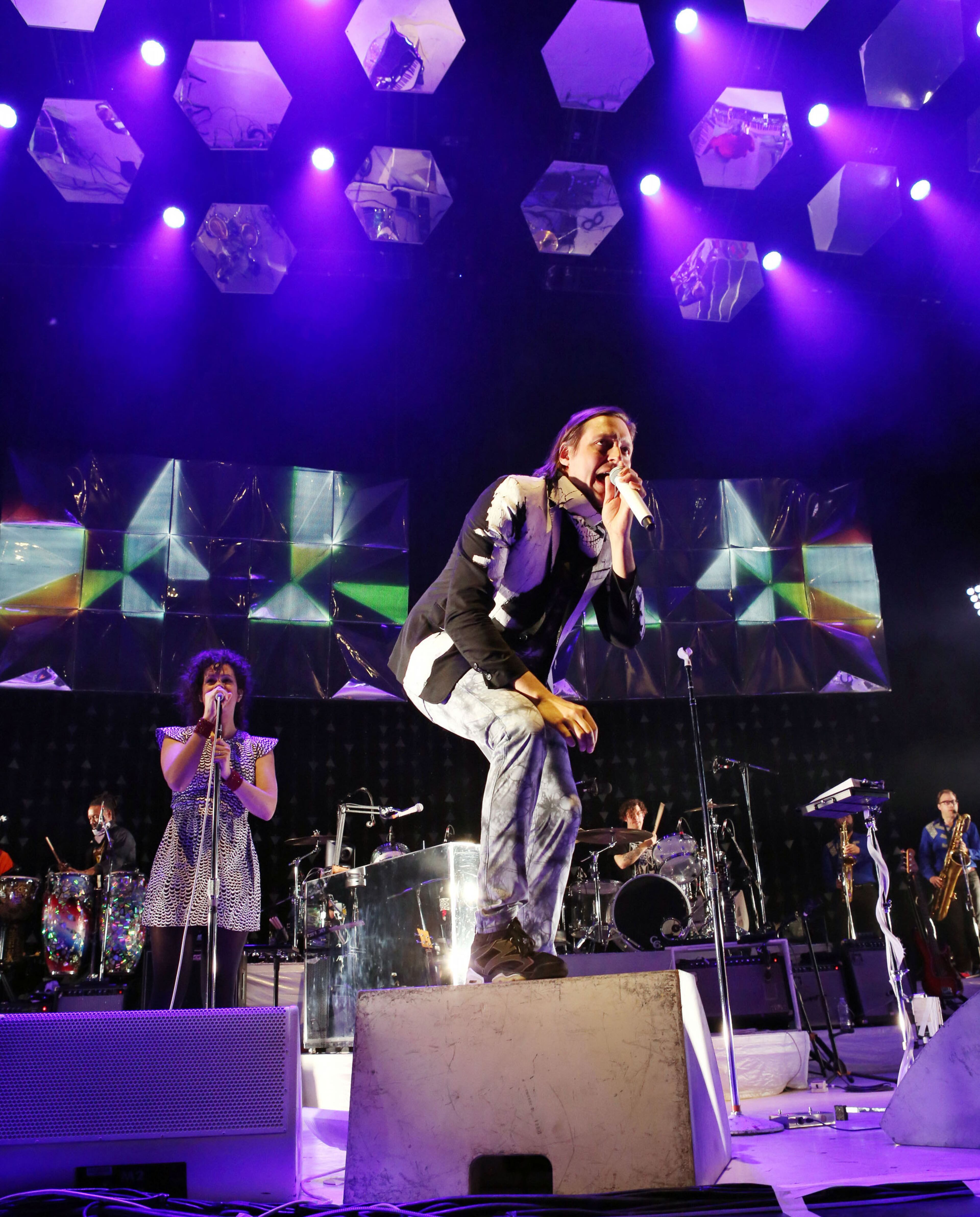 Win Butler leads Arcade Fire on "Reflektor" Friday, May 2, 2014 at Aaron's Amphitheatre at Lakewood in Atlanta.