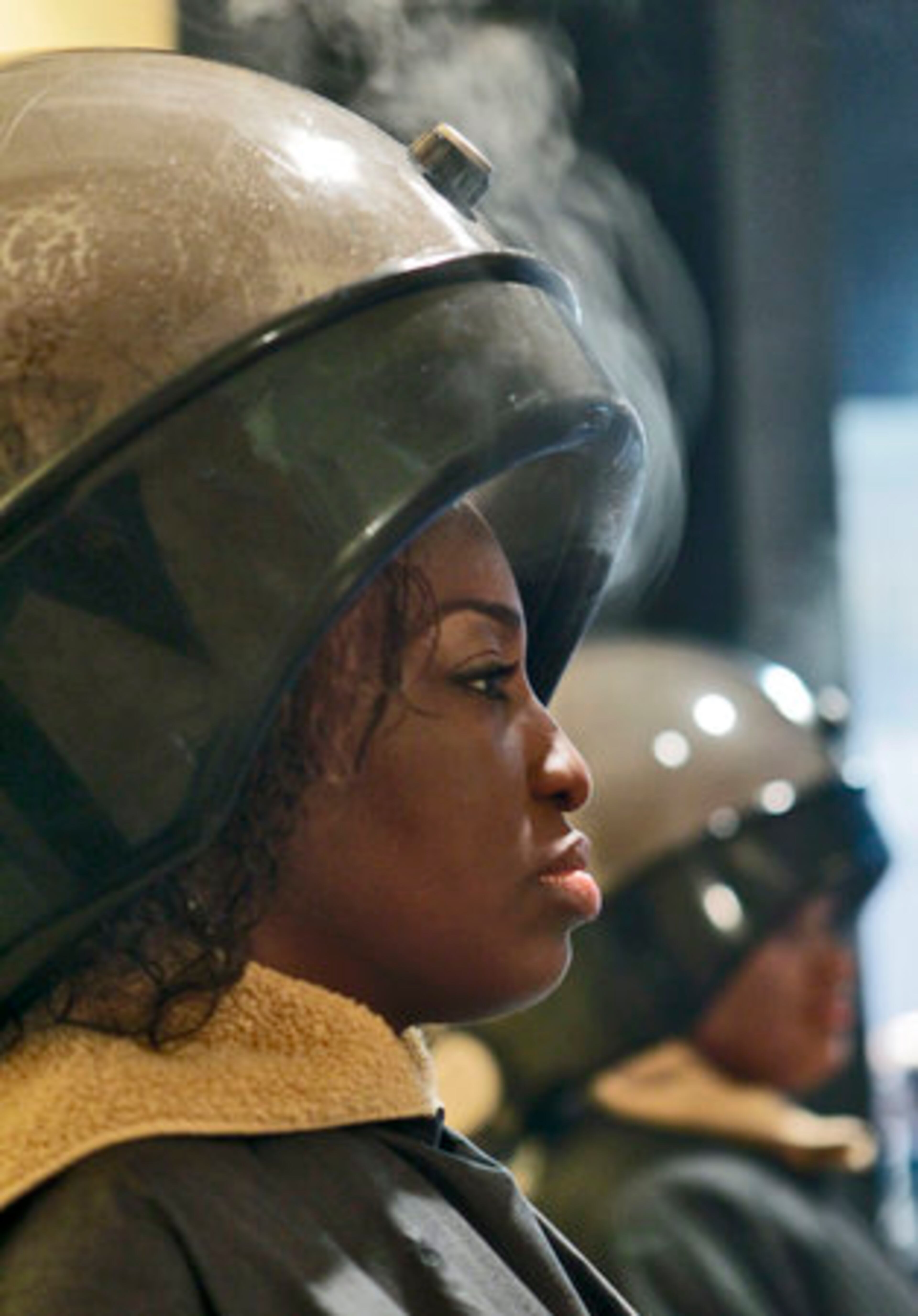 After her hair is shampooed, Lashima Tate spends a few minutes getting steam therapy.