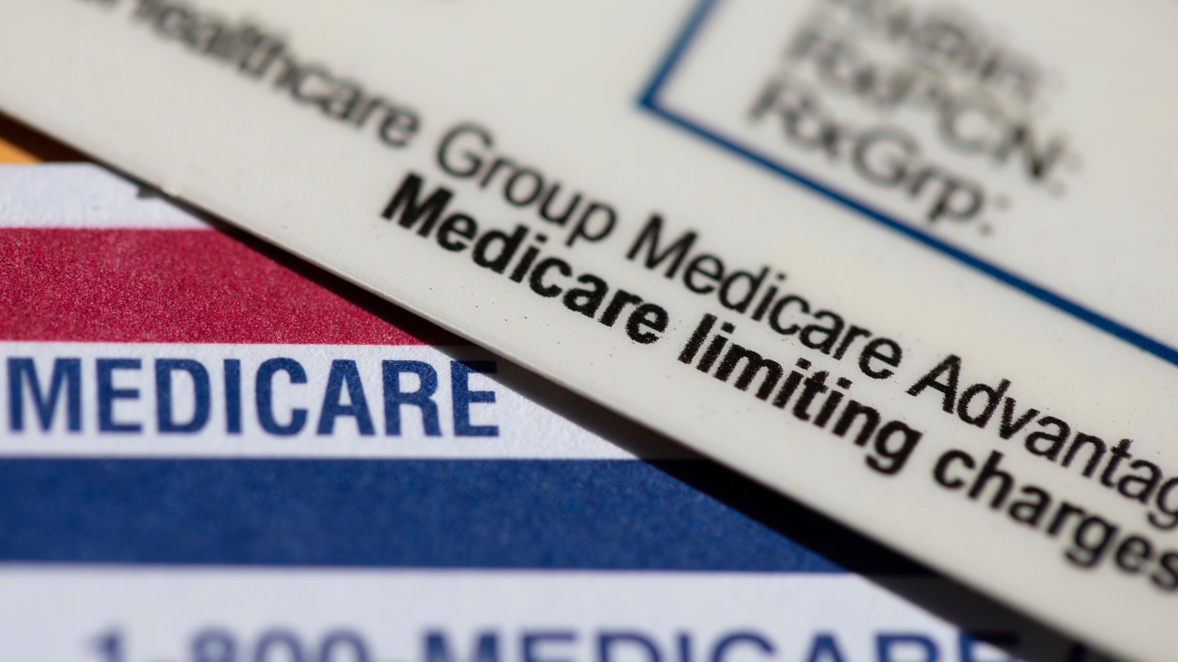FILE - A Medicare Advantage PPO card rests on top of a Medicare card in Portland, Ore., June 10, 2024. (AP Photo/Jenny Kane, File)