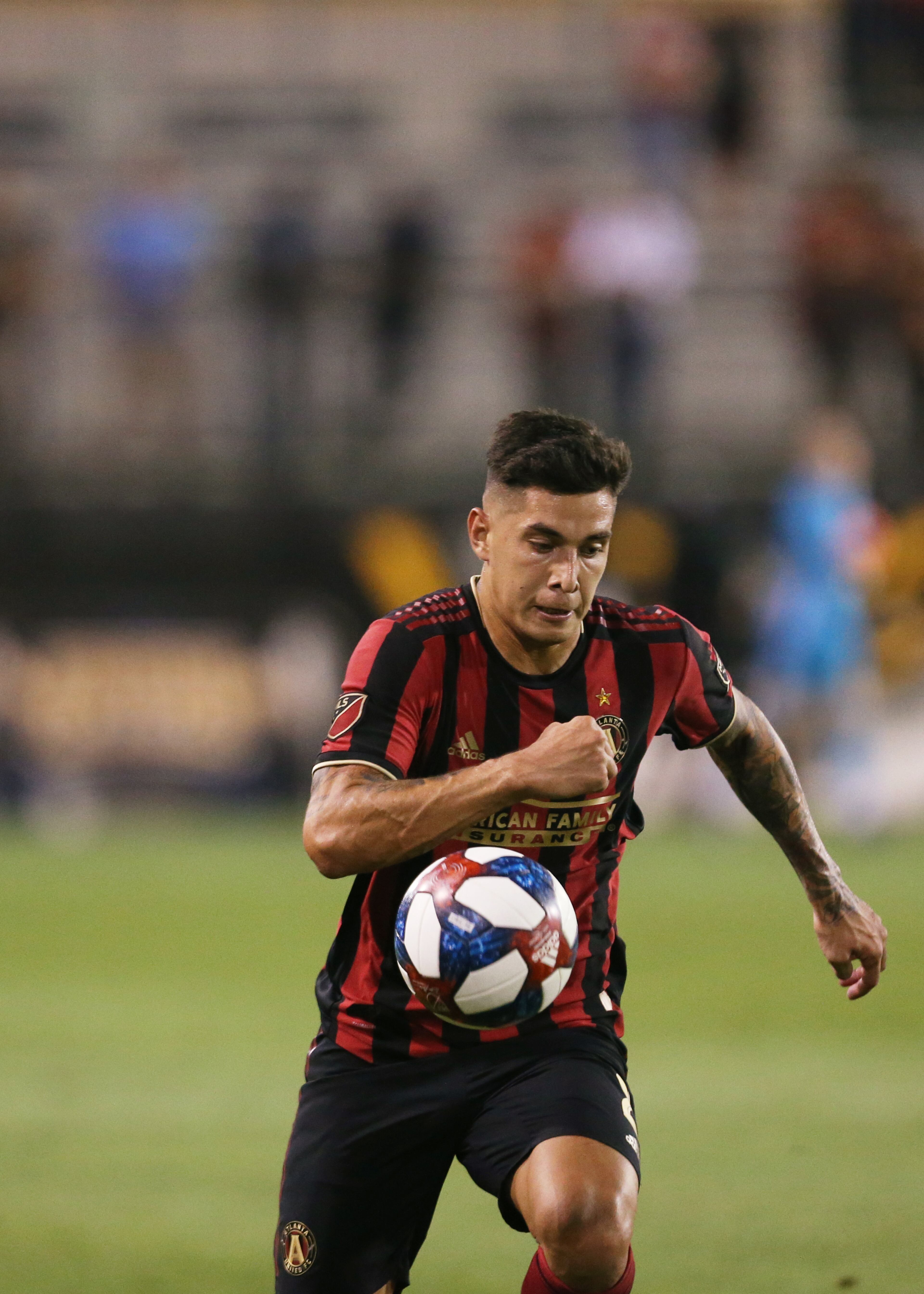 Franco Escobar of Atlanta United drives the ball down the field. Christina Matacotta/Christina.Matacotta@ajc.com
