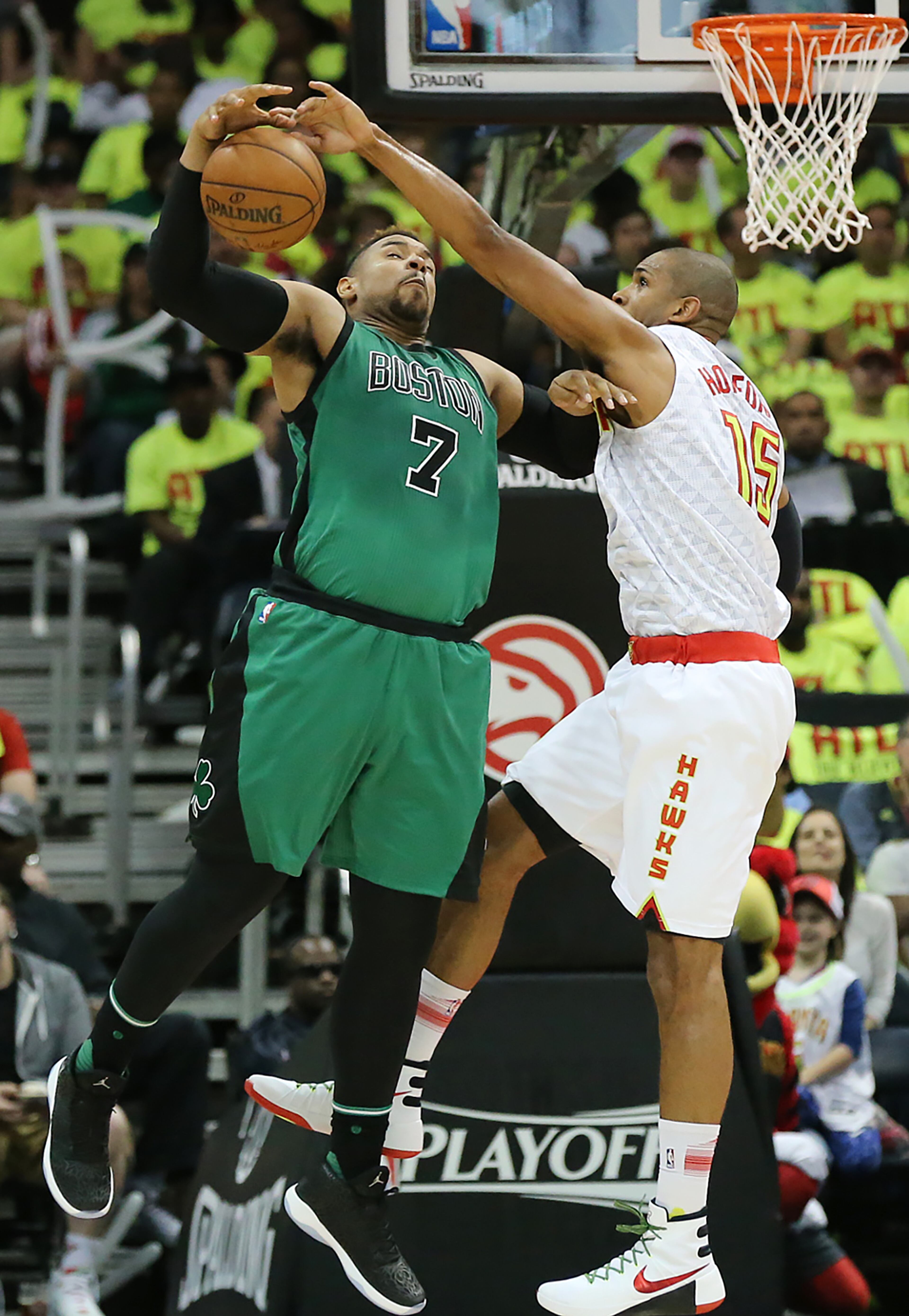 041616 ATLANTA: Hawks Al Horford blocks a shot by Celtics Jared Sullinger and forces a turnover in their first NBA Playoff basketball game at Philips Arena on Saturday, April 16, 2016. Curtis Compton / ccompton@ajc.com