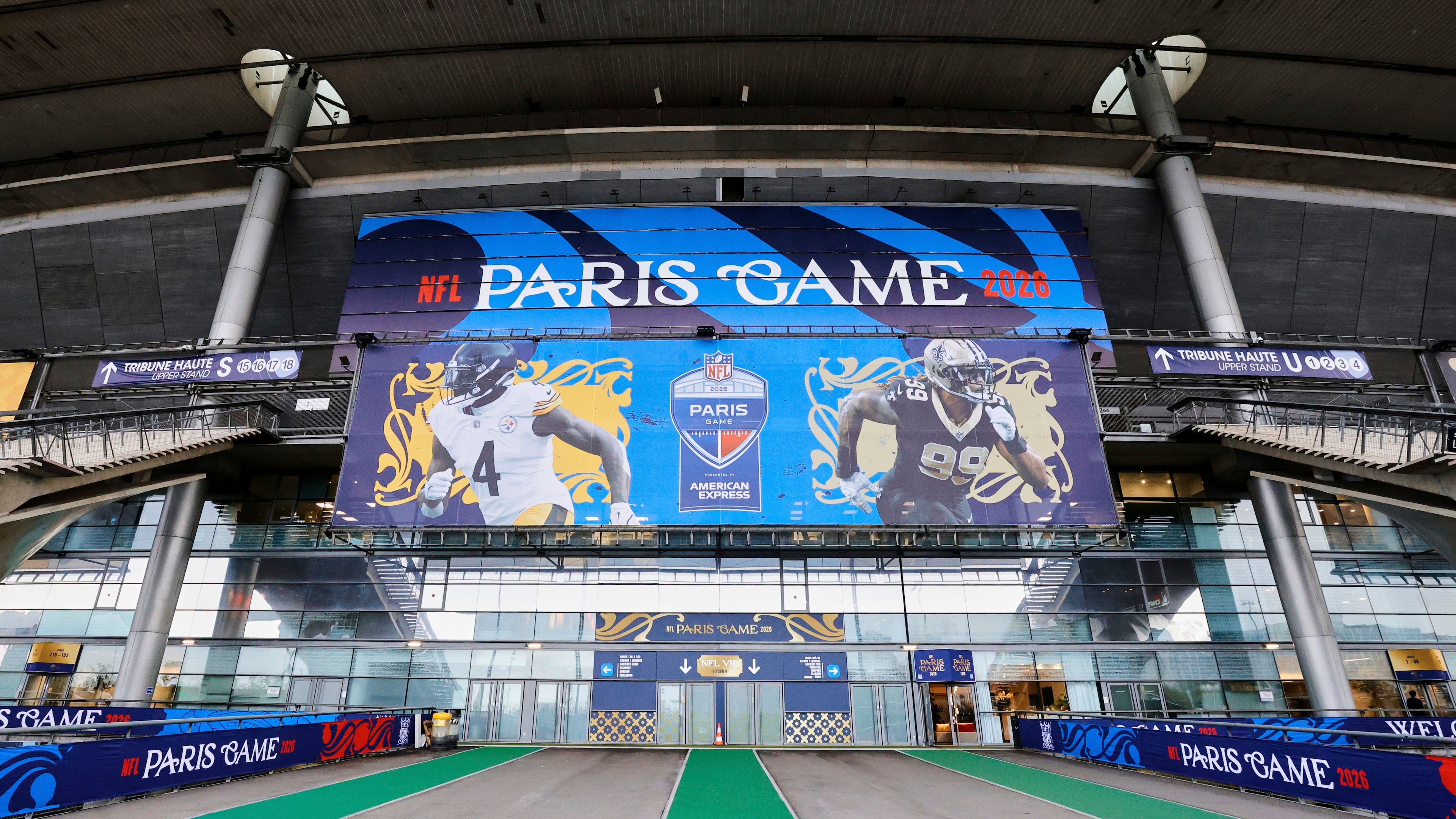 An exterior view of the Stade de France with NFL branding on Thursday, Oct. 22, 2026, in Saint-Denis, north of Paris, ahead of Sunday's game between the Pittsburgh Steelers and the New Orleans Saints. (AP Photo/Greg Payan)