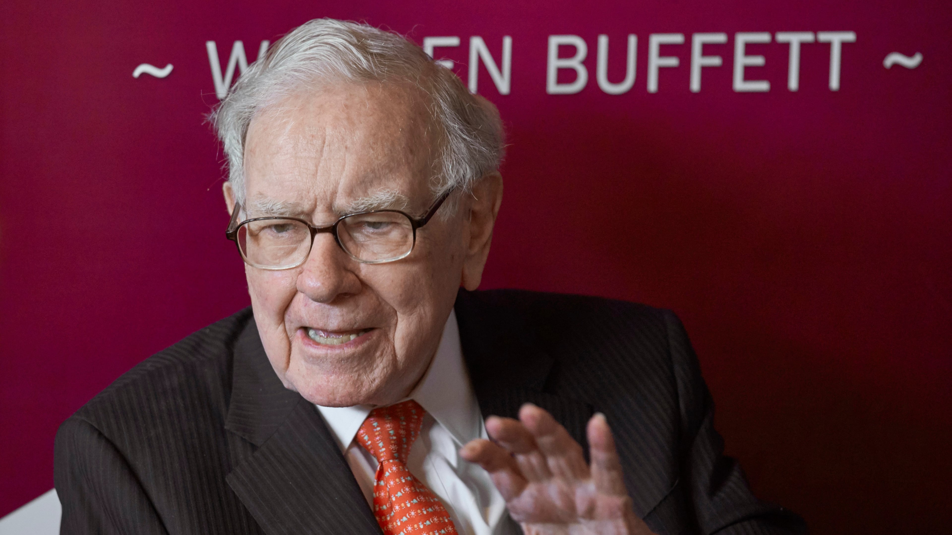 FILE - Warren Buffett, chairman and CEO of Berkshire Hathaway, speaks during a game of bridge following the annual Berkshire Hathaway shareholders meeting May 5, 2019, in Omaha, Neb. (AP Photo/Nati Harnik, File)