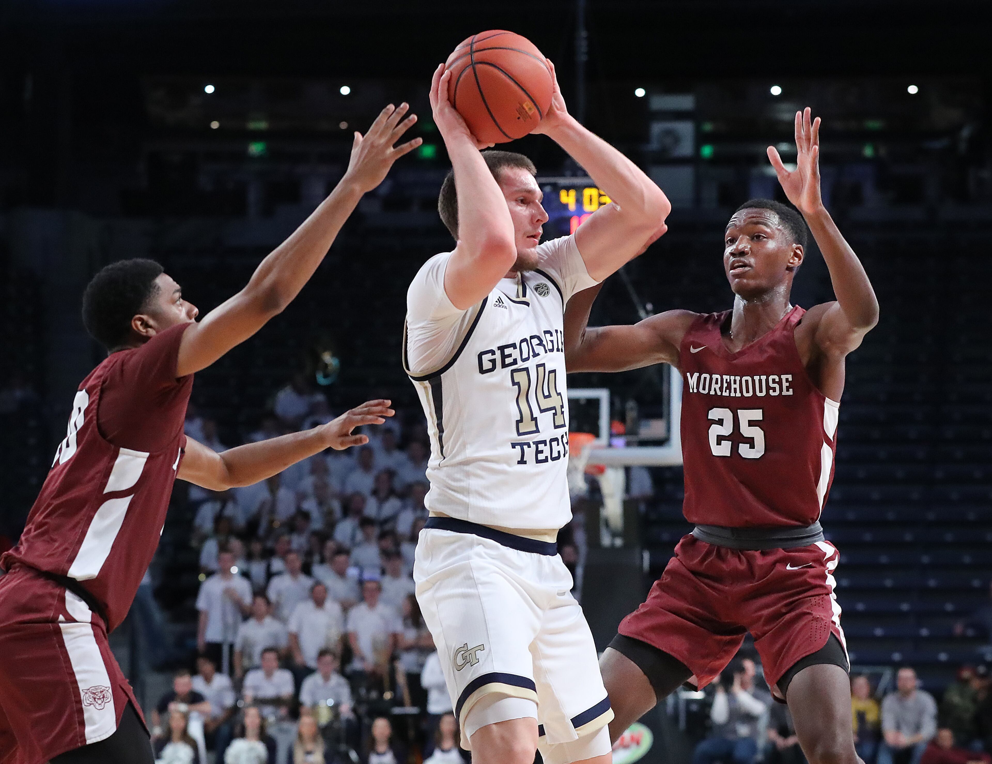 Georgia Tech forward David Didenko is double teamed by Morehouse defenders Jordan Sterling (left) and Xavier Brewer during a 82-54 victory in a NCAA college basketball game on Tuesday, January 28, 2020, in Atlanta. Curtis Compton ccompton@ajc.com
