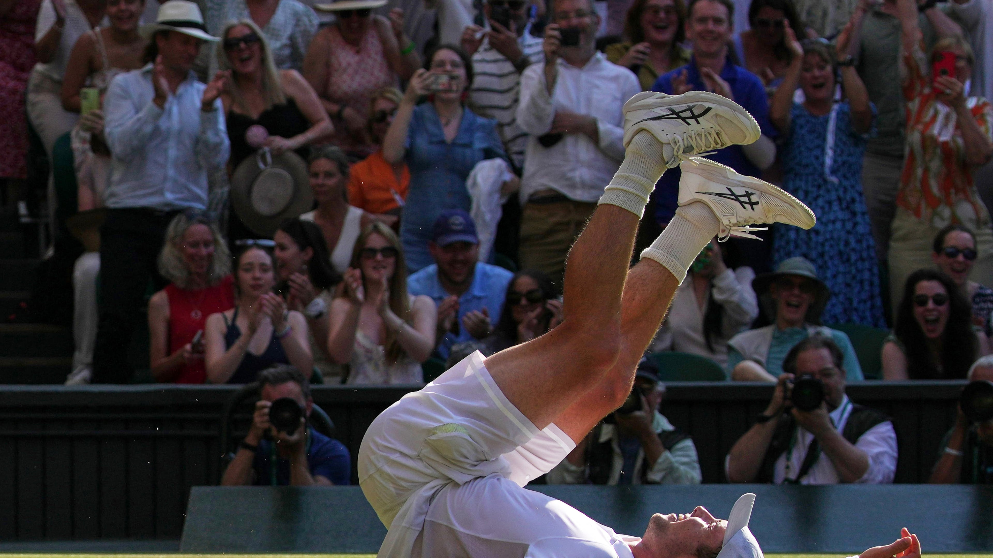 Arthur Fery of Britain reacts to winning against Flavio Cobolli of Italy in their quarter-final men's singles match at the Wimbledon Tennis Championships in London, Wednesday, July 8, 2026. (AP Photo/Brian Inganga)