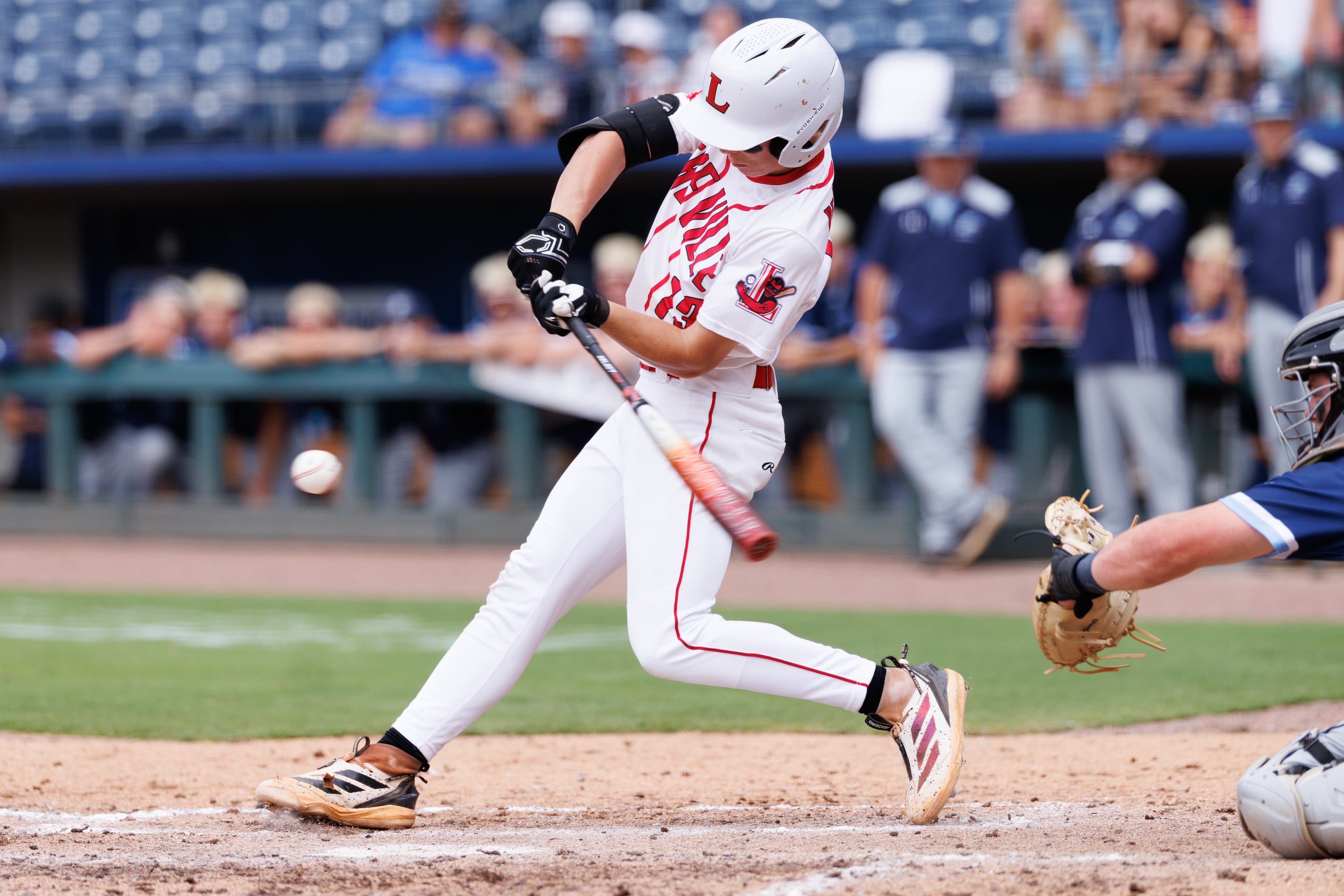 Loganville's Kaiden Howell swings during the fifth inning of Game 1 of the GHSA Class 5A baseball state championship series Monday, May 25, 2026, at Gwinnett Field in Lawrenceville. (Estela Muñoz/AJC)