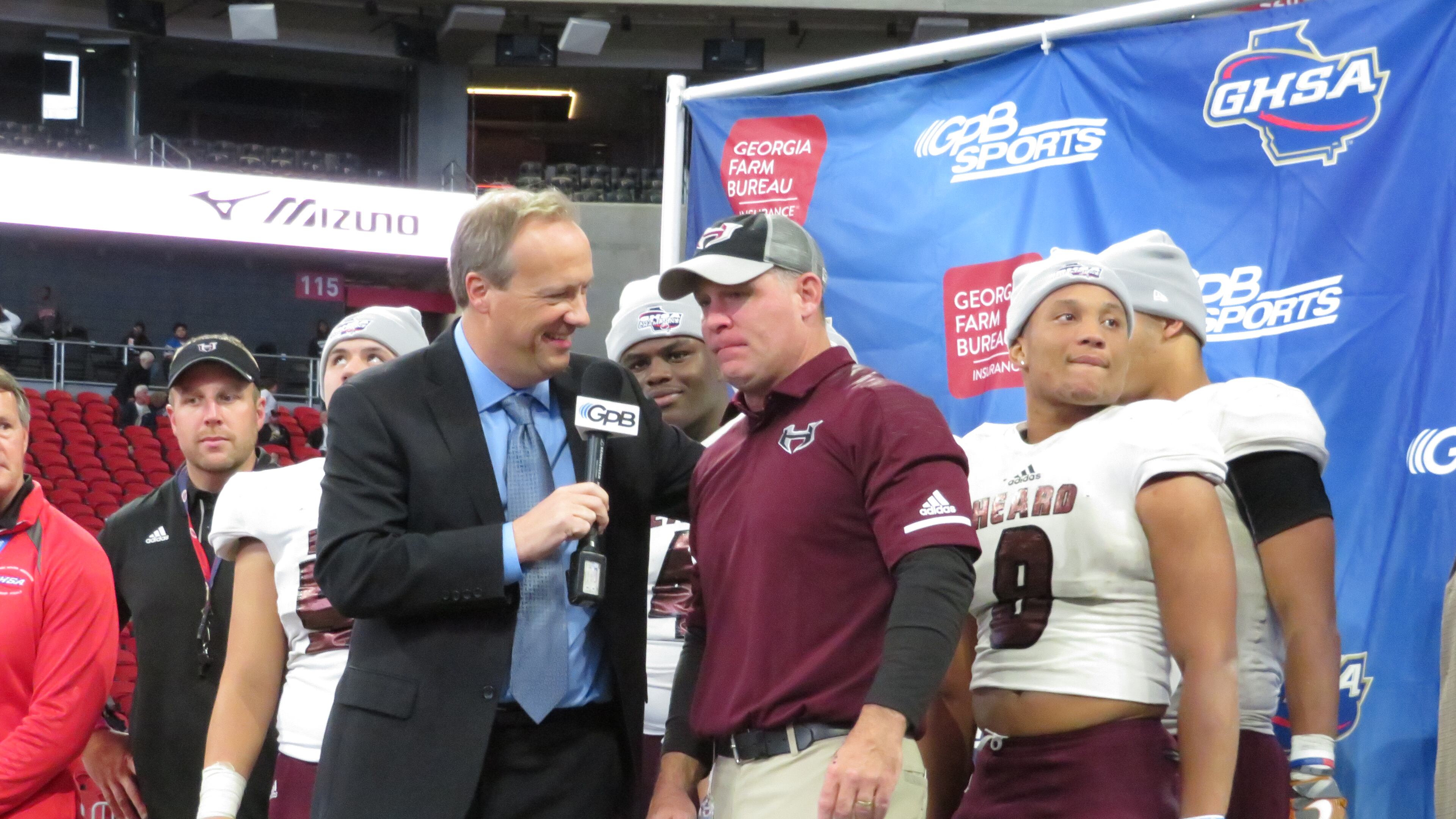 Jon Nelson of GPB Sports interviews former Heard County coach Tim Barron after his team won the Class 2A championship in 2018. (Adam Krohn/special)