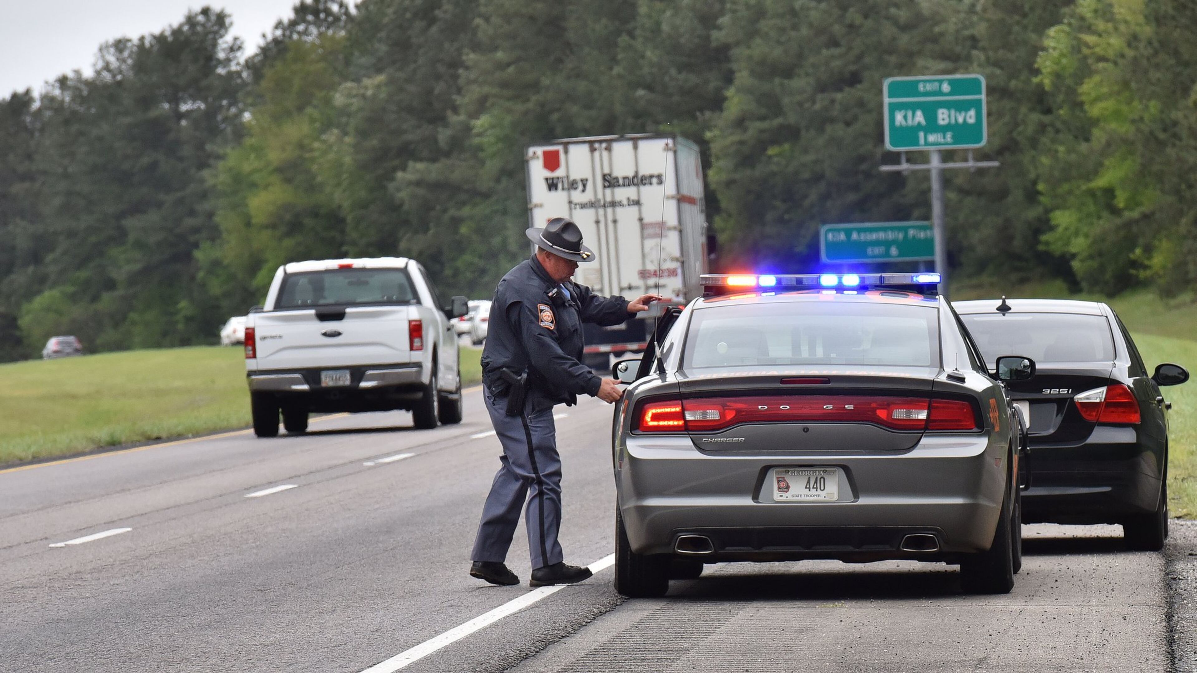 Master trooper Bernie Talley makes a speeding stop on I-85 in LaGrange in April 2016. There are huge swatches of Georgia, almost all in rural Georgia, in which there are no troopers on the roads in the middle of the night. HYOSUB SHIN / HSHIN@AJC.COM