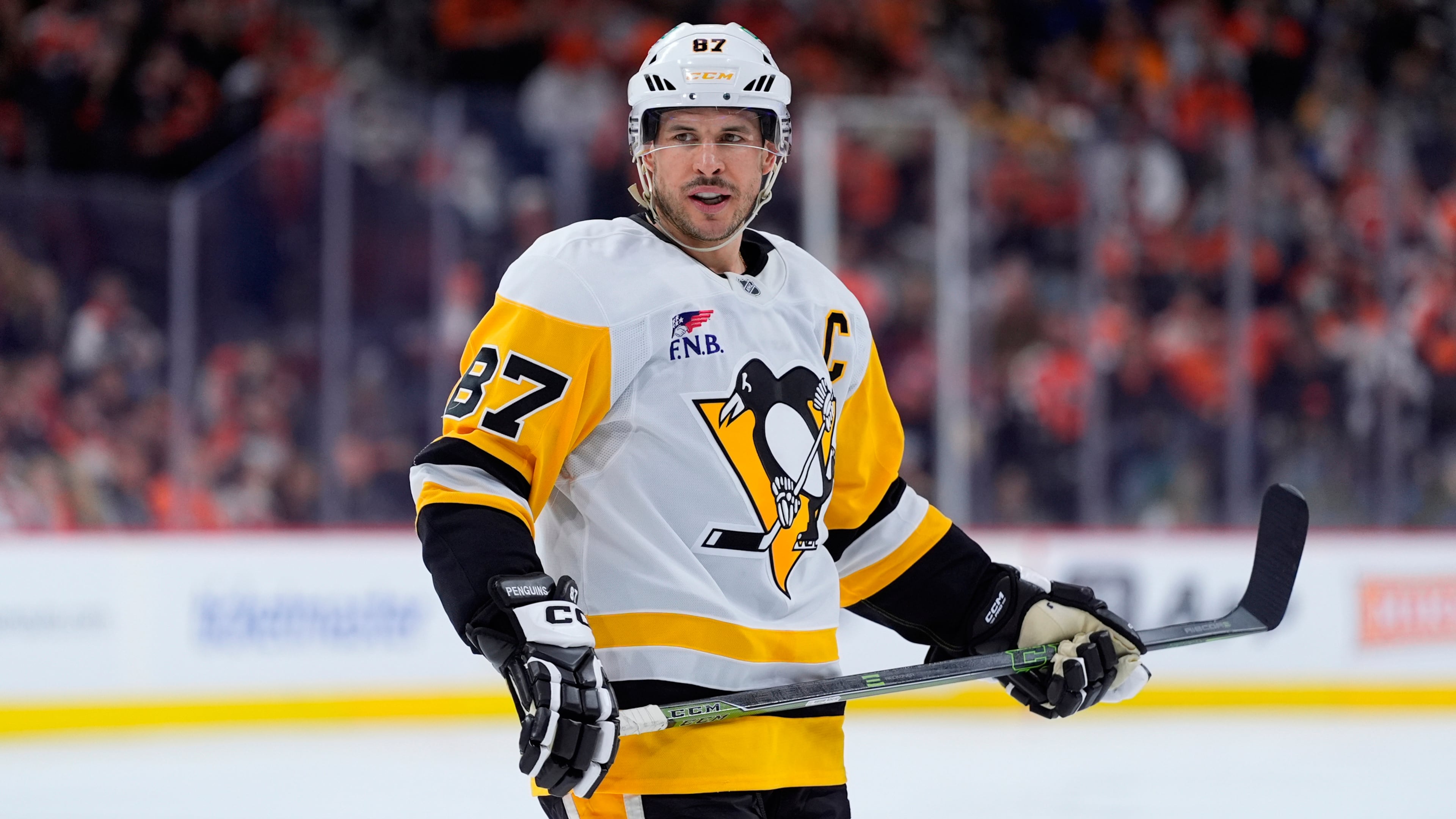 FILE - Pittsburgh Penguins' Sidney Crosby looks on during a break in Game 6 in the first round of the NHL hockey Stanley Cup playoffs series, April 29, 2026, in Philadelphia. (AP Photo/Matt Slocum, File)