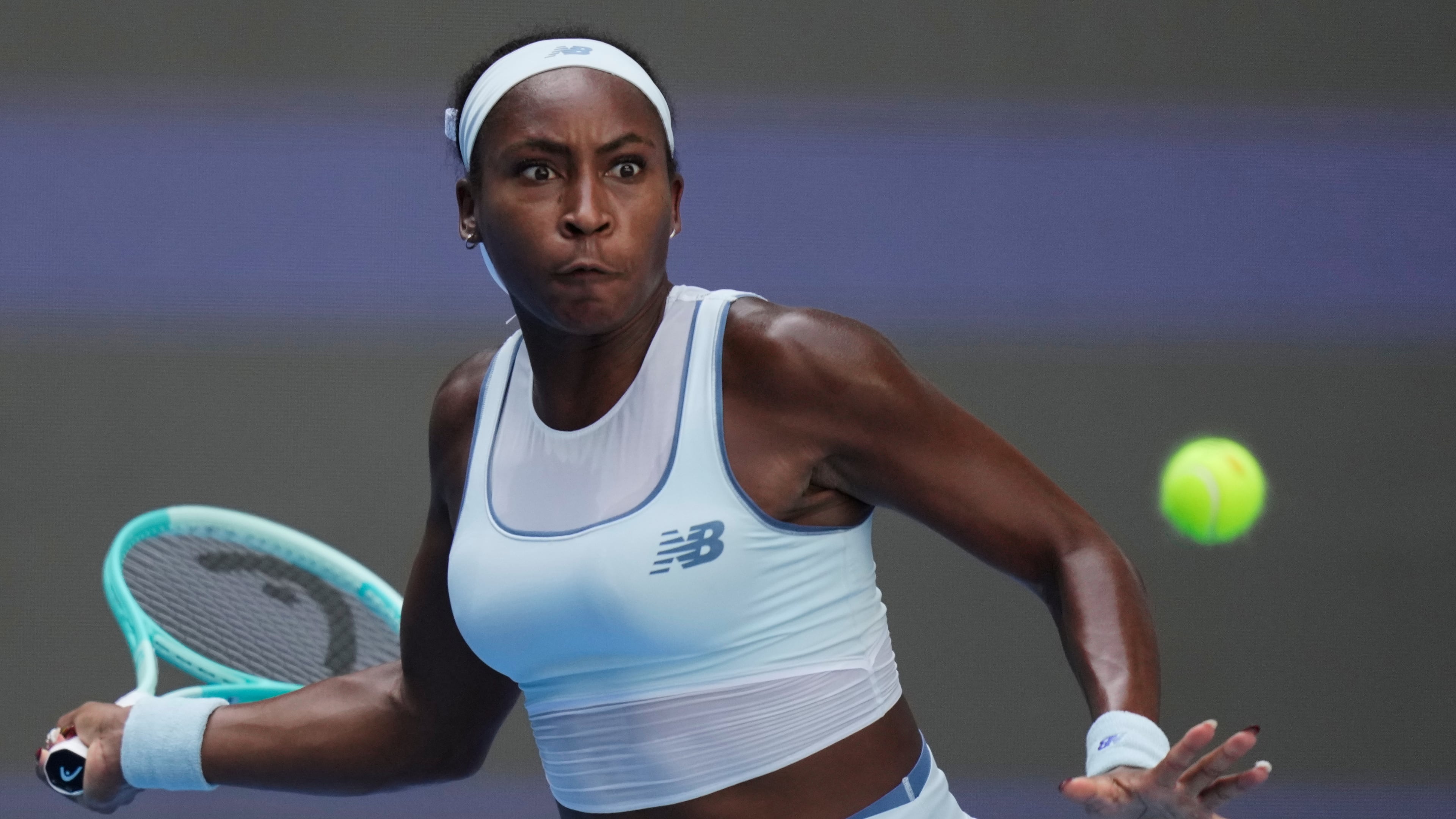 FILE - Coco Gauff of the United States plays a forehand to Belinda Bencic of Switzerland during a women's singles match of the China Open tennis tournament, in Beijing, on Sept. 30, 2025. (AP Photo/Mahesh Kumar A., File)