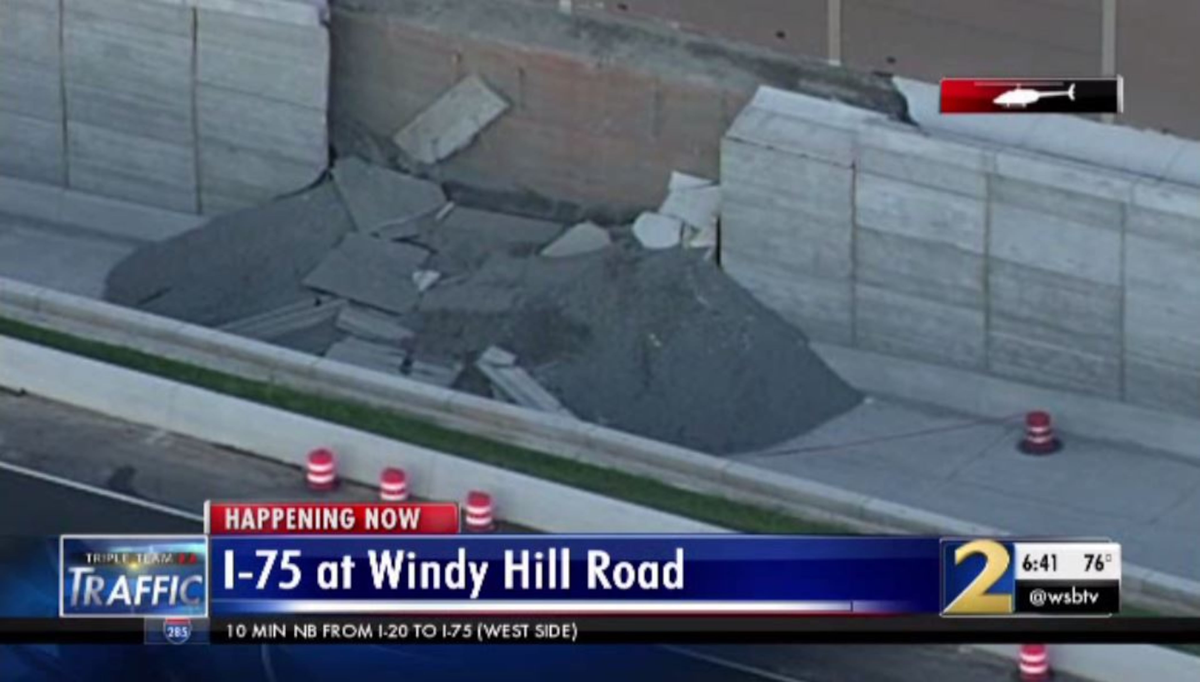 According to the WSB 24-hour Traffic Center, a wall collapsed along an unfinished portion of the Northwest Corridor Express Lanes project.