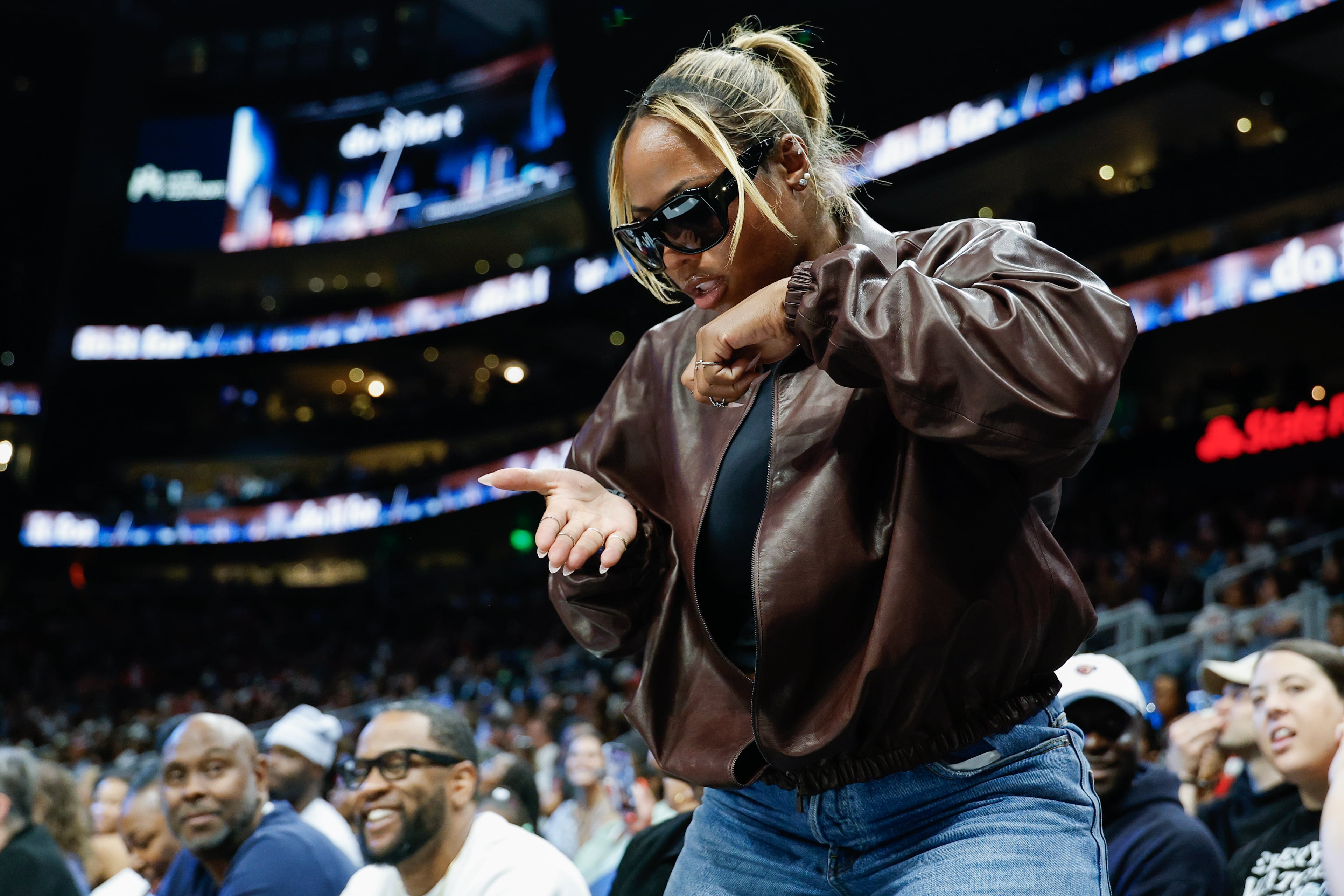 Professional tennis player Taylor Townsend reacts during the second half of a WNBA semifinal playoff game 1 between the Atlanta Dream and the New York Liberty, Sunday, Oct. 4, 2026, in Atlanta. (Erik S. Lesser for the AJC)