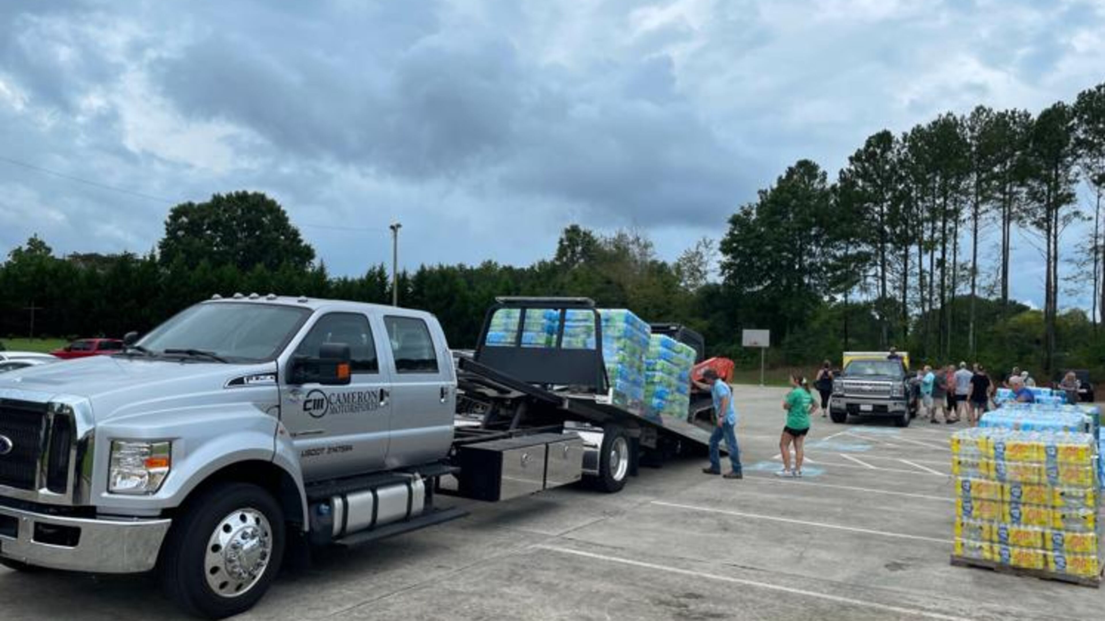 Volunteers with Rome GA Cares loaded water onto trucks headed to Summerville, GA following heavy flooding in the area. (Courtesy of Rome GA Cares)