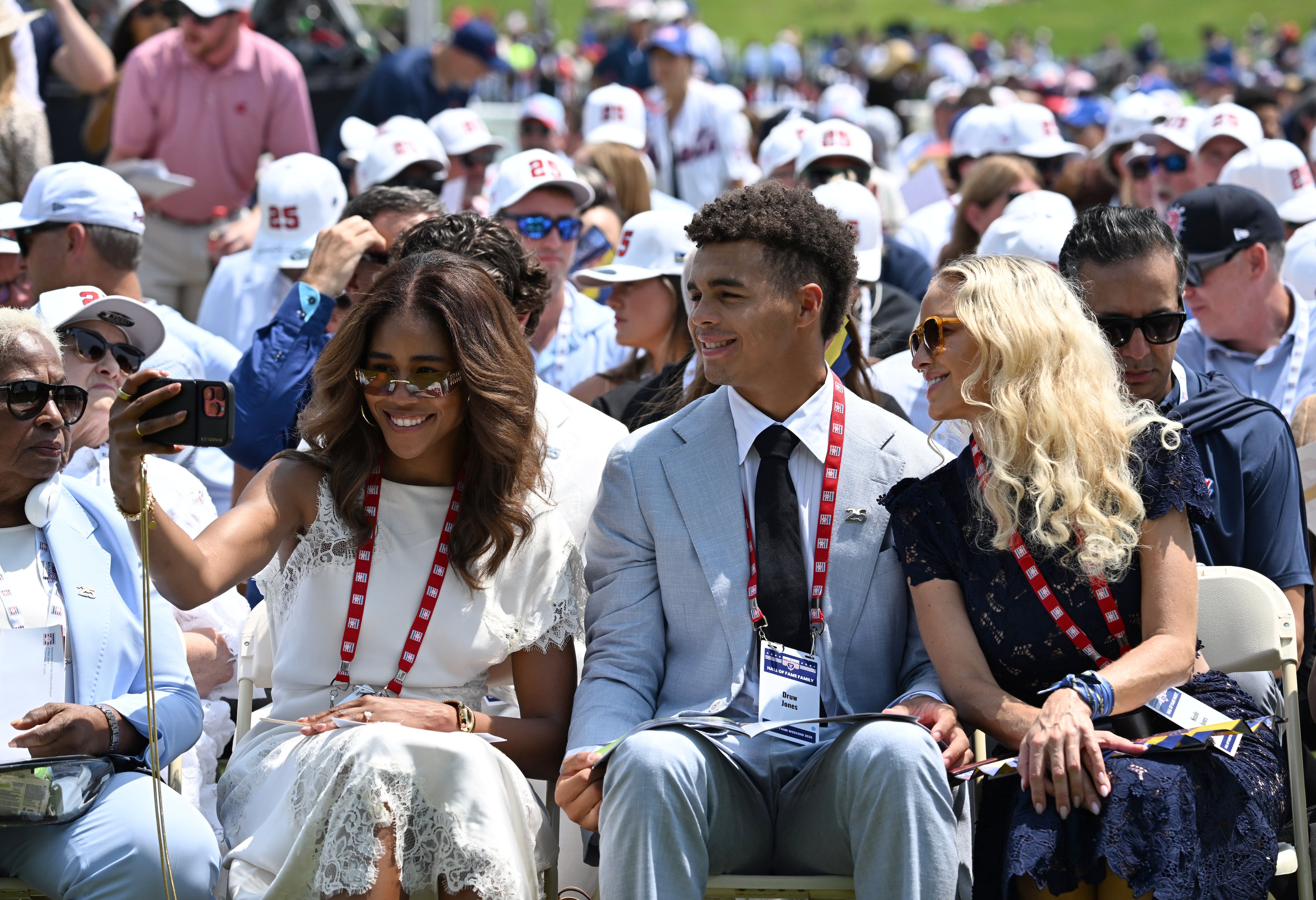 Andruw Jones’ former wife, Nicole, right, poses with her children, Madison, left, and Druw, before the 2026 National Baseball Hall of Fame Induction Ceremony at the Clark Sports Center on Sunday, July 26, 2026, in Cooperstown, N.Y. Braves centerfielder Andruw Jones is set for induction into the National Baseball Hall of Fame as part of the Class of 2026, alongside Carlos Beltrán and Jeff Kent. (Hyosub Shin/AJC)