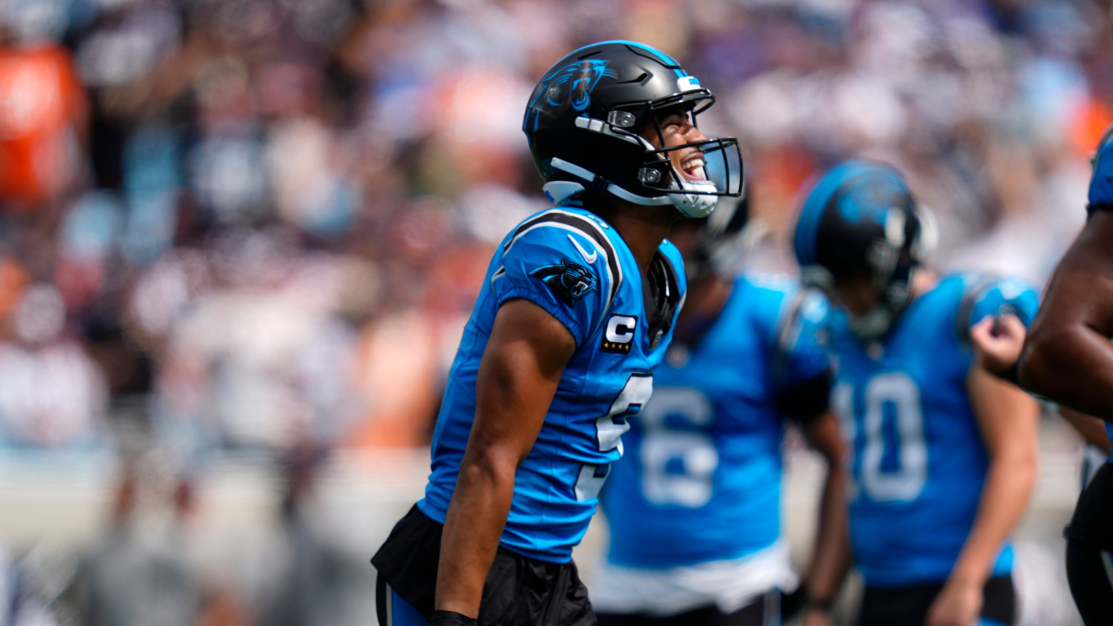 Carolina Panthers quarterback Bryce Young (9) celebrates after scoring a touchdown during the first half of an NFL football game, Sunday, Sept. 13, 2026, in Charlotte, N.C. (AP Photo/Erik Verduzco)