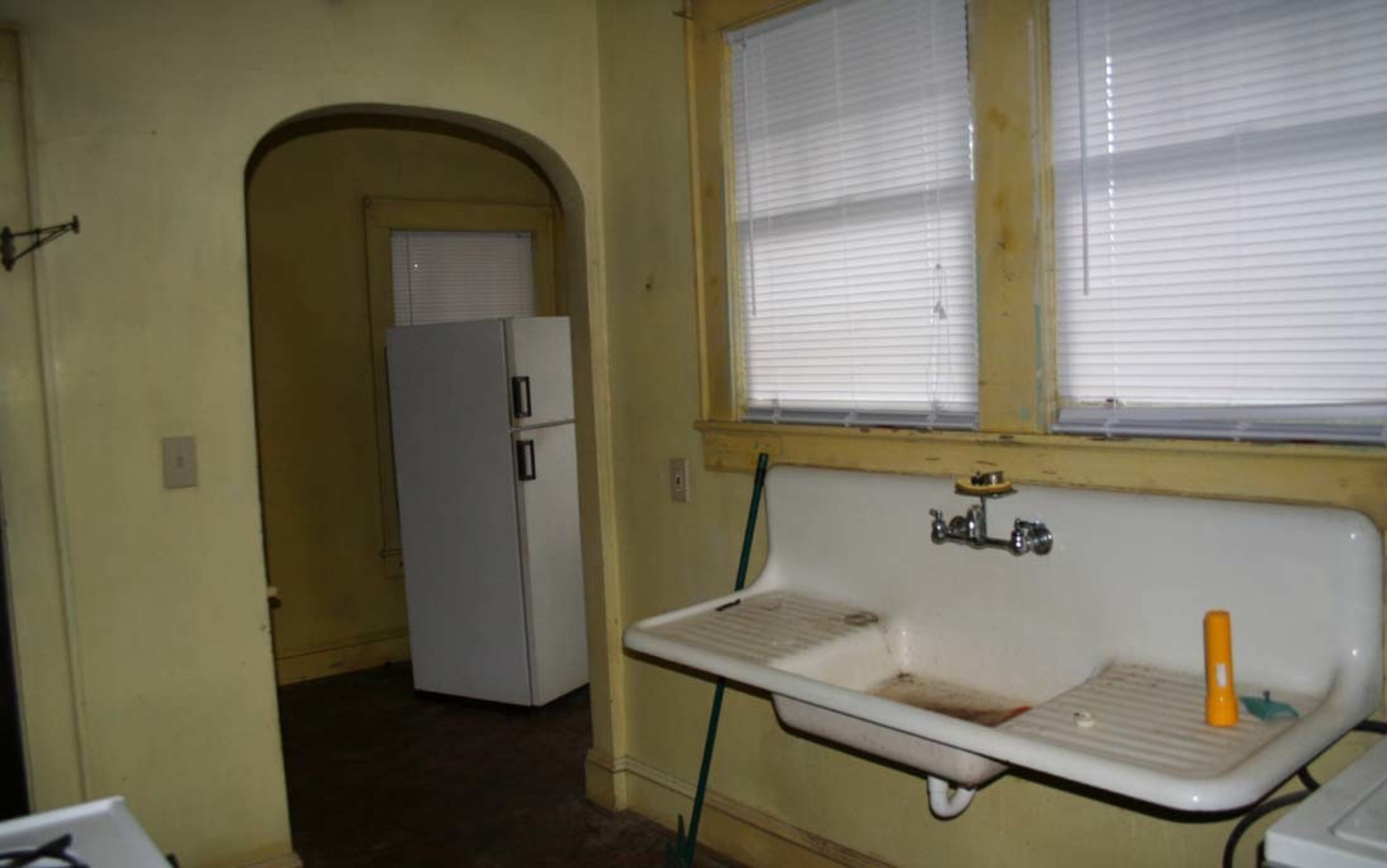 The original kitchen was small and inconveinent. With the expansion of the house, the renovators put in a gourmet kitchen.