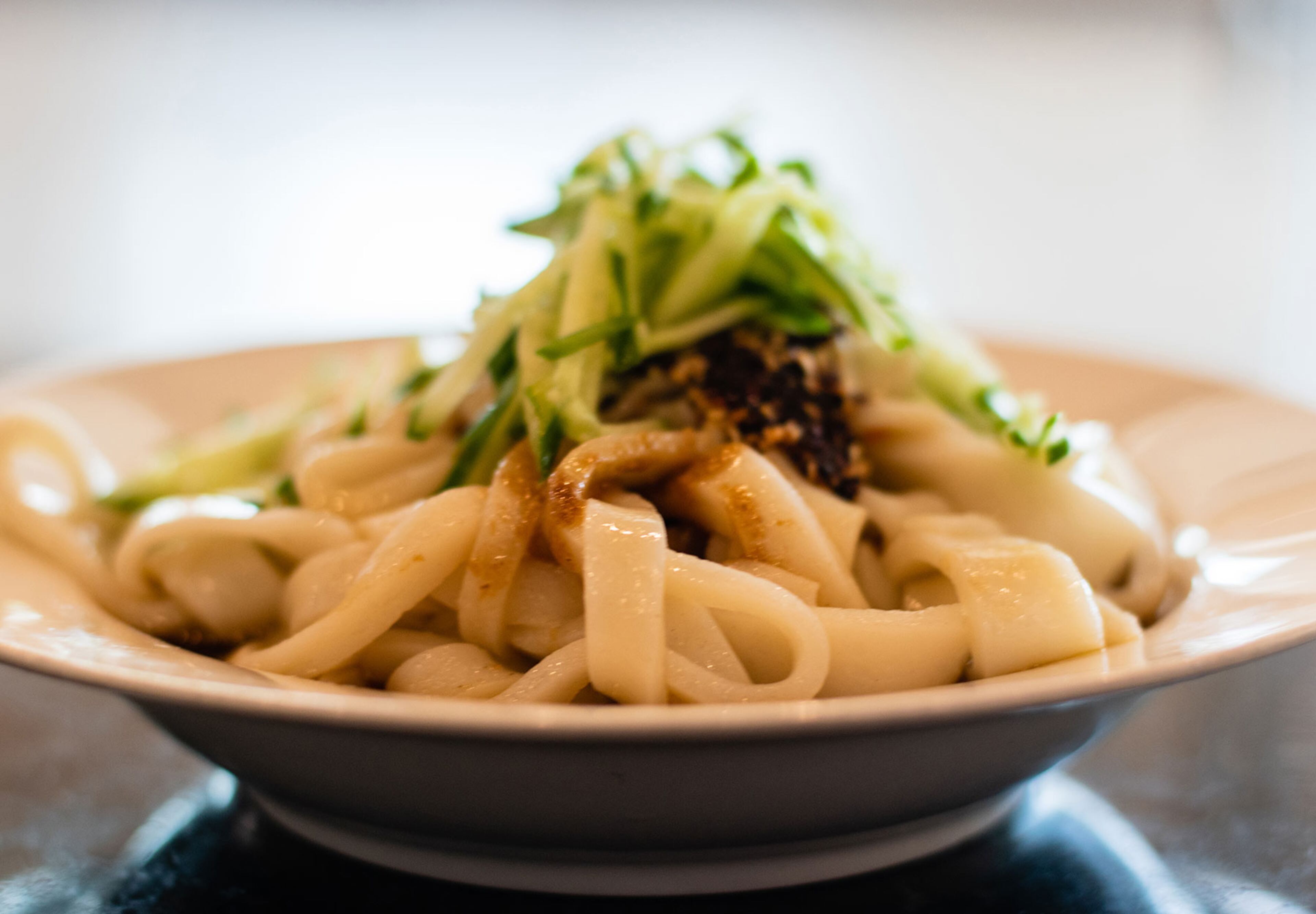 Liang pi cold skin noodles strike a refreshing note alongside the other huge portions of spicy Chinese fare available at Xi'an Gourmet in the Jusgo Food Court.