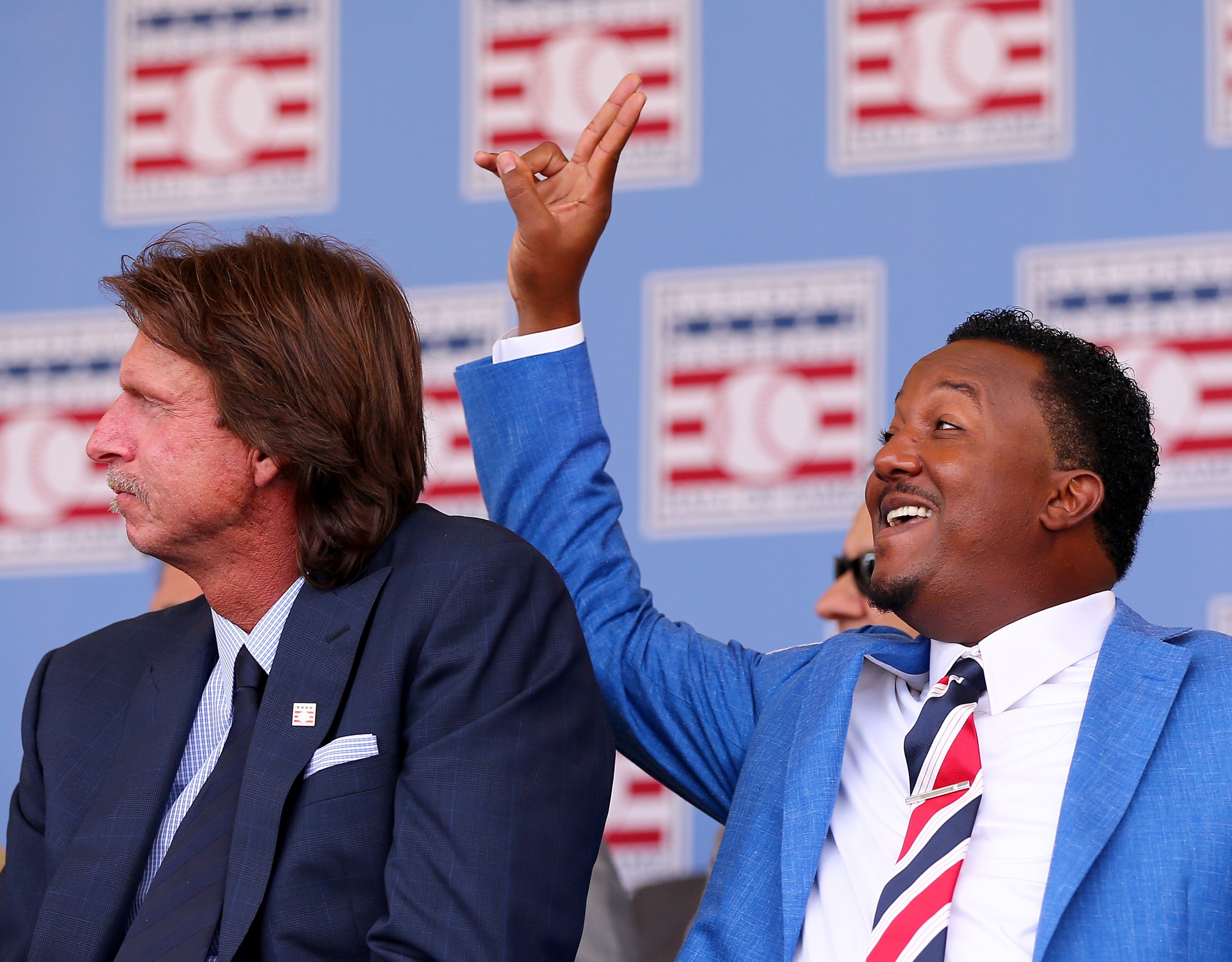 COOPERSTOWN, NY - JULY 26: Randy Johnson and Pedro Martinez enjoy the Hall of Fame Induction Ceremony at National Baseball Hall of Fame on July 26, 2015 in Cooperstown, New York.Johnson was inducted with Pedro Martinez;Craig Biggio and John Smoltz (Photo by Elsa/Getty Images)