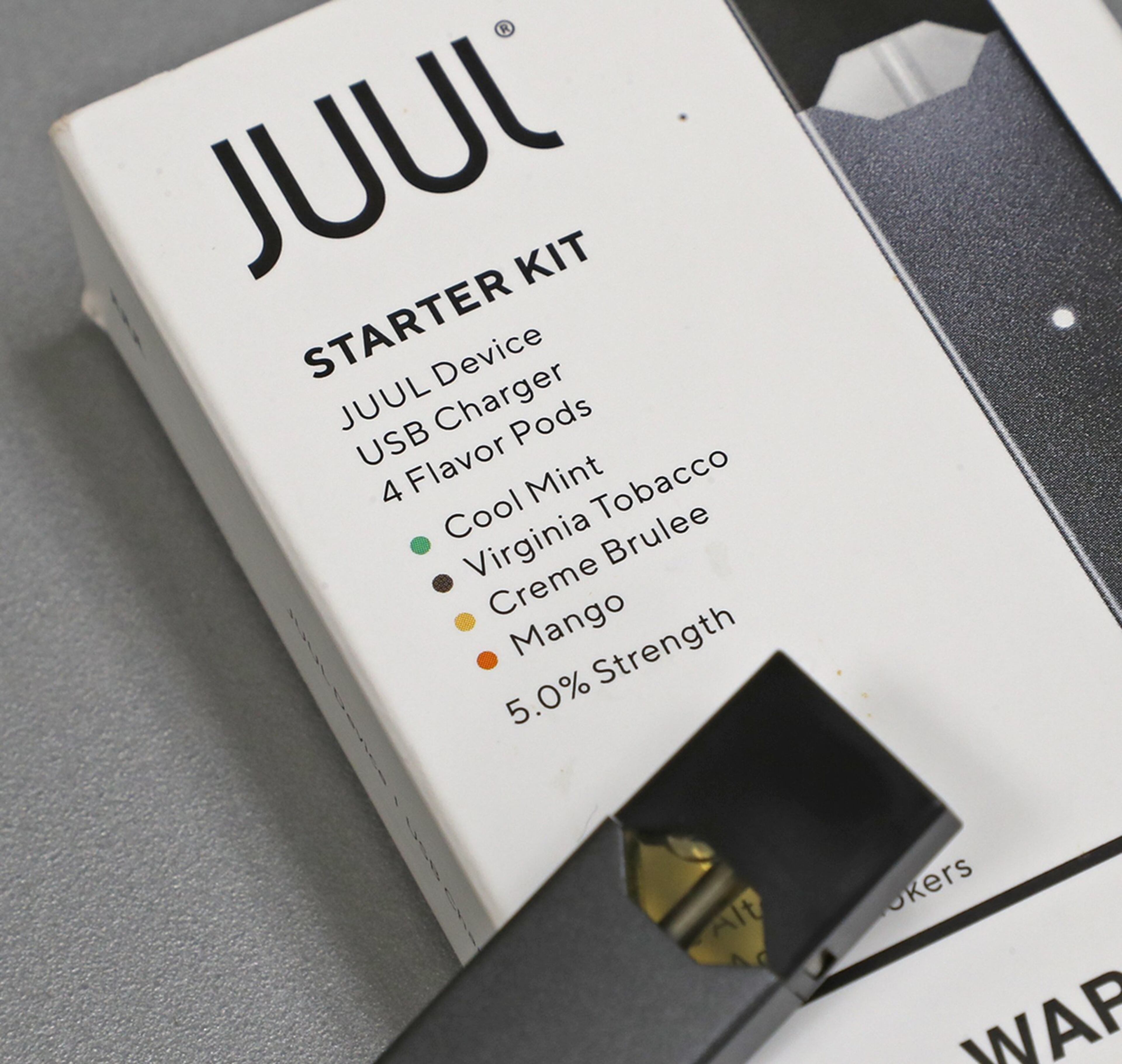 A Juul starter kit with flavors like Mango and Creme Brulee.