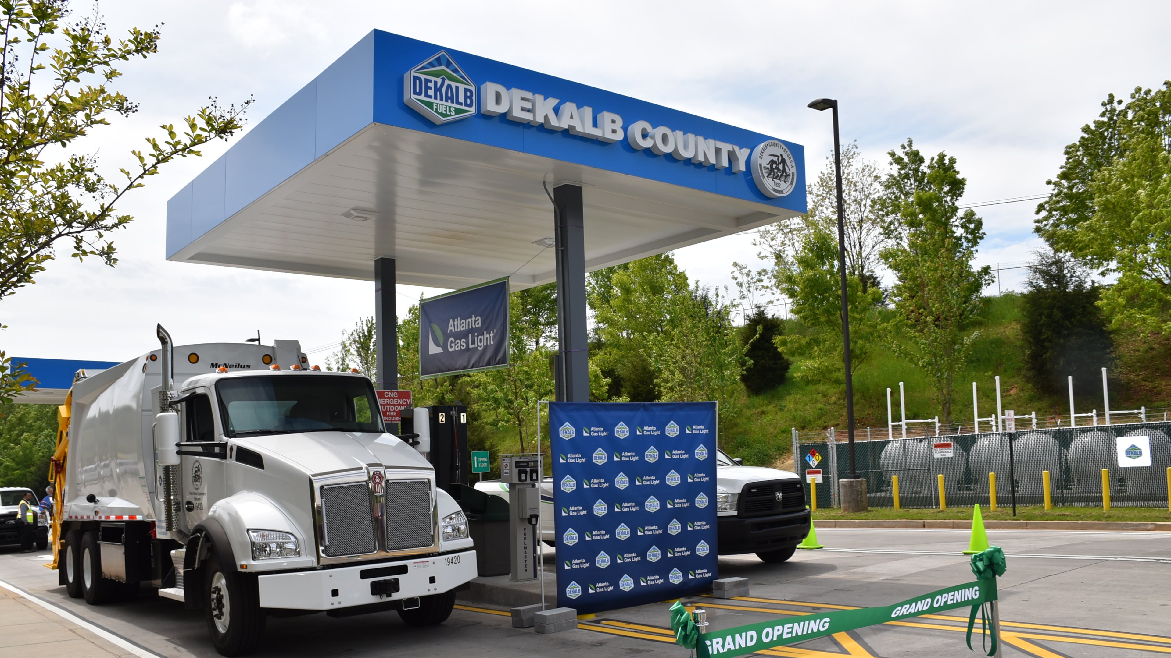 DeKalb officials and Atlanta Gas Light celebrated the grand opening of a compressed natural gas fueling station Thursday. Photo credit: DeKalb County