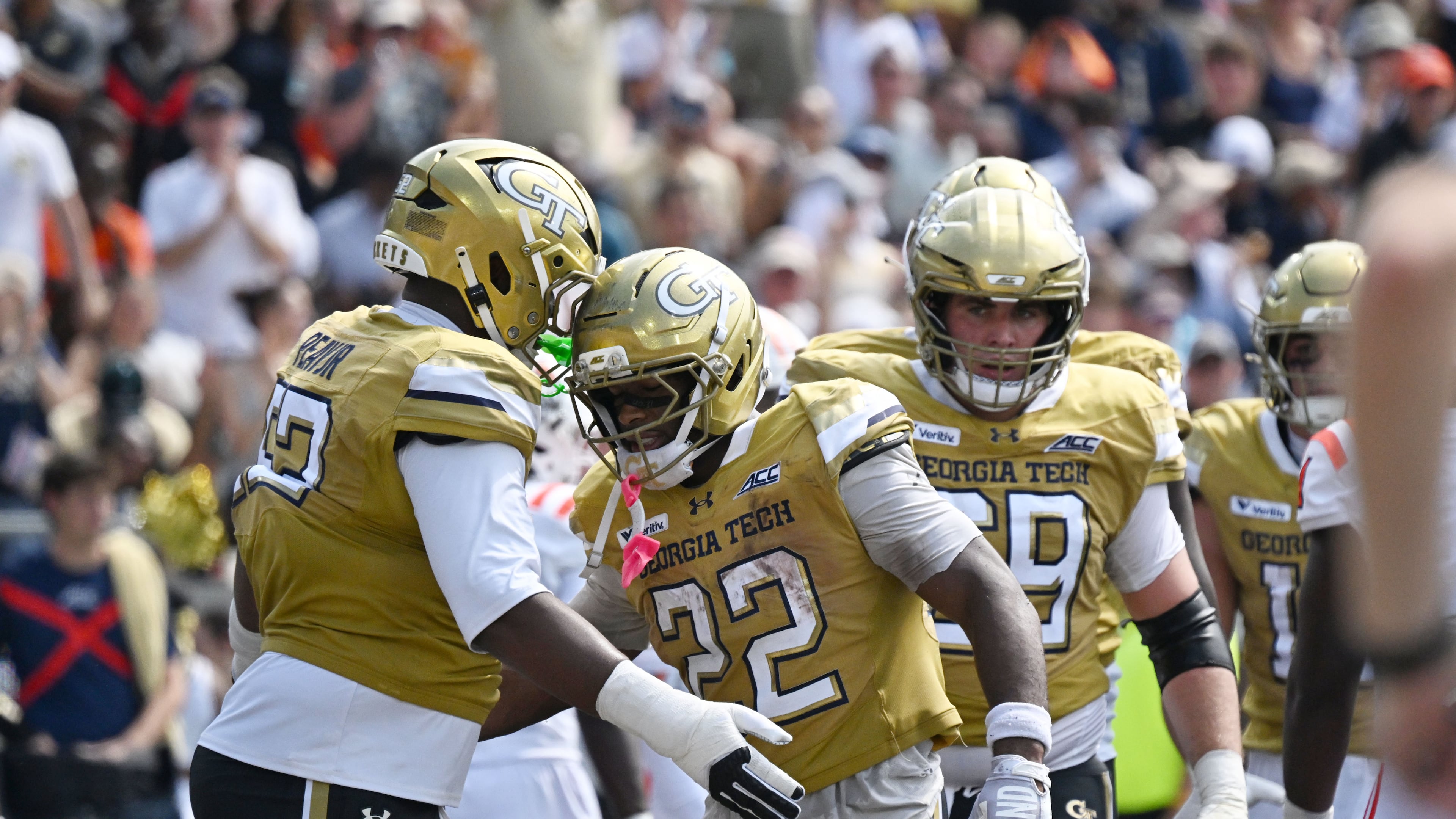 Georgia Tech running back Justice Haynes (center) celebrates after scoring a touchdown against Mercer on Saturday, Sept. 19, 2026, at Bobby Dodd Stadium in Atlanta. Haynes has 167 total yards and three touchdowns in the Yellow Jackets' 44-11 win. (Hyosub Shin/AJC)