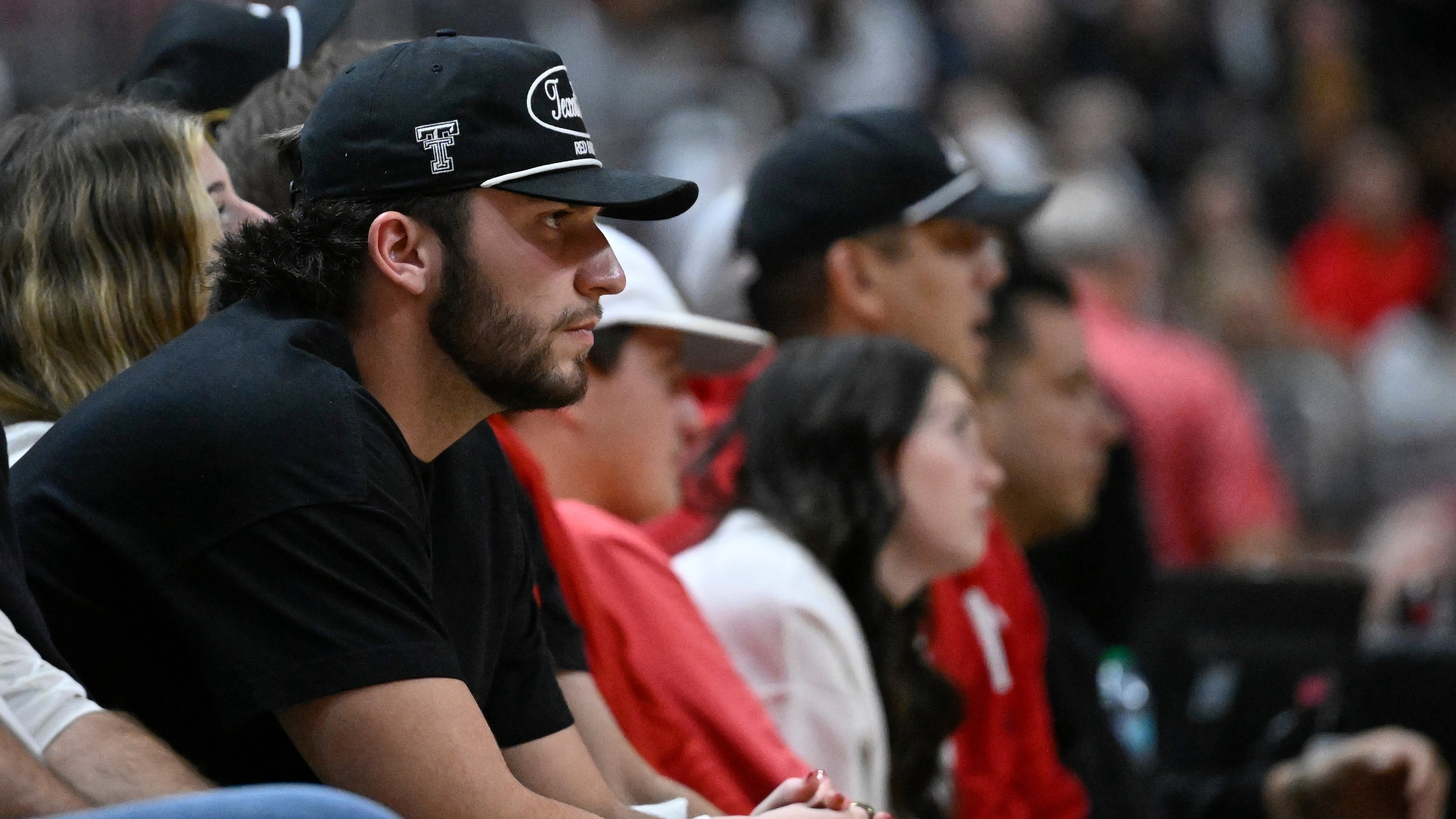 FILE - Texas Tech quarterback Brendan Sorsby watches the second half of an NCAA college basketball game between Texas Tech and Cincinnati, Feb. 24, 2026, in Lubbock, Texas. (AP Photo/Justin Rex, file)
