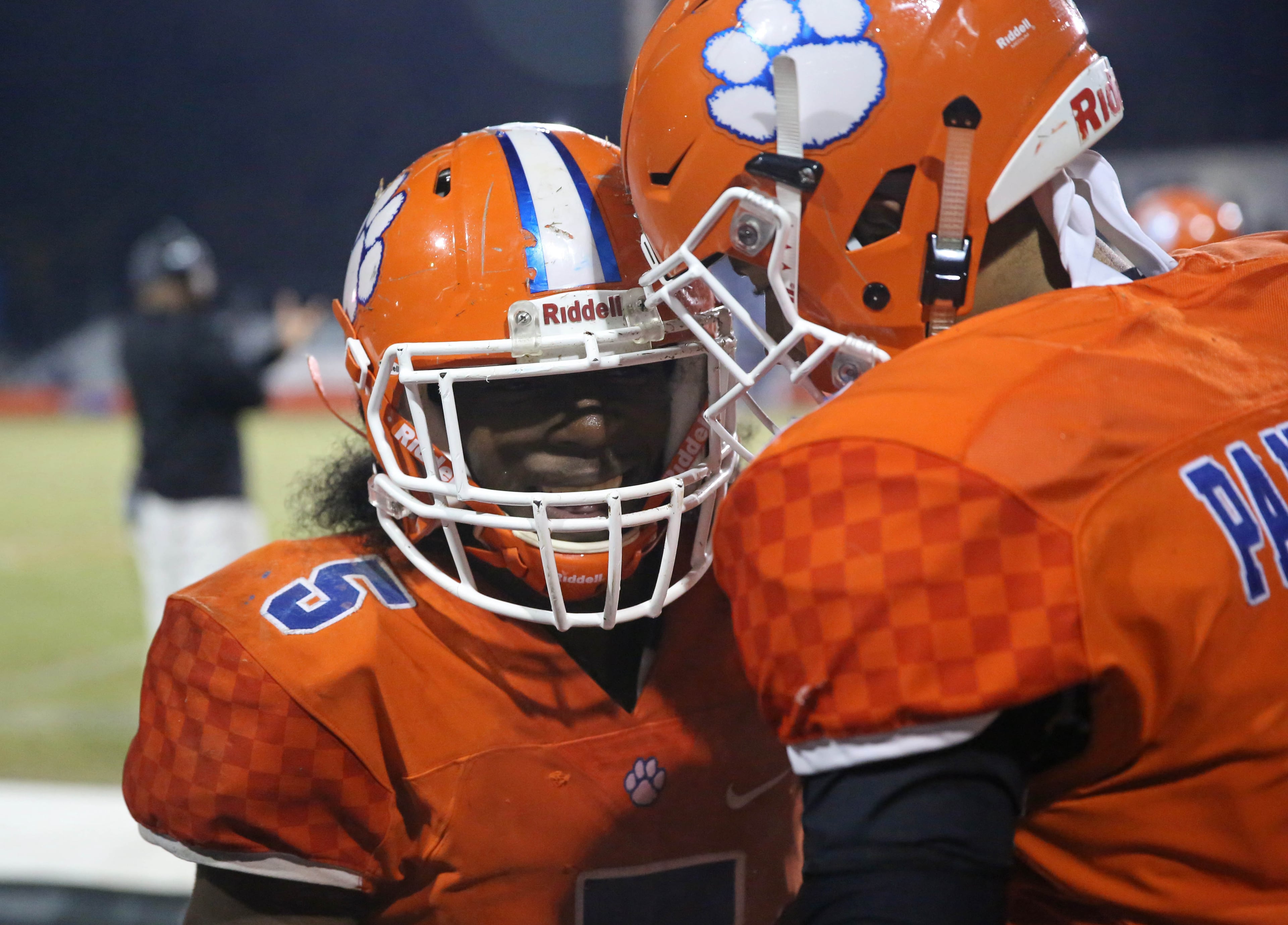 Parkview running back Tommy Rogers (5) celebrates his rushing touchdown with quarterback Fred Payton (9) in the second half of their game against Newton in the first round of the Class AAAAAAA playoffs at Parkview High School Friday, November 10, 2017, in Lilburn, Ga. Parkview won 42-35 in overtime. PHOTO / JASON GETZ