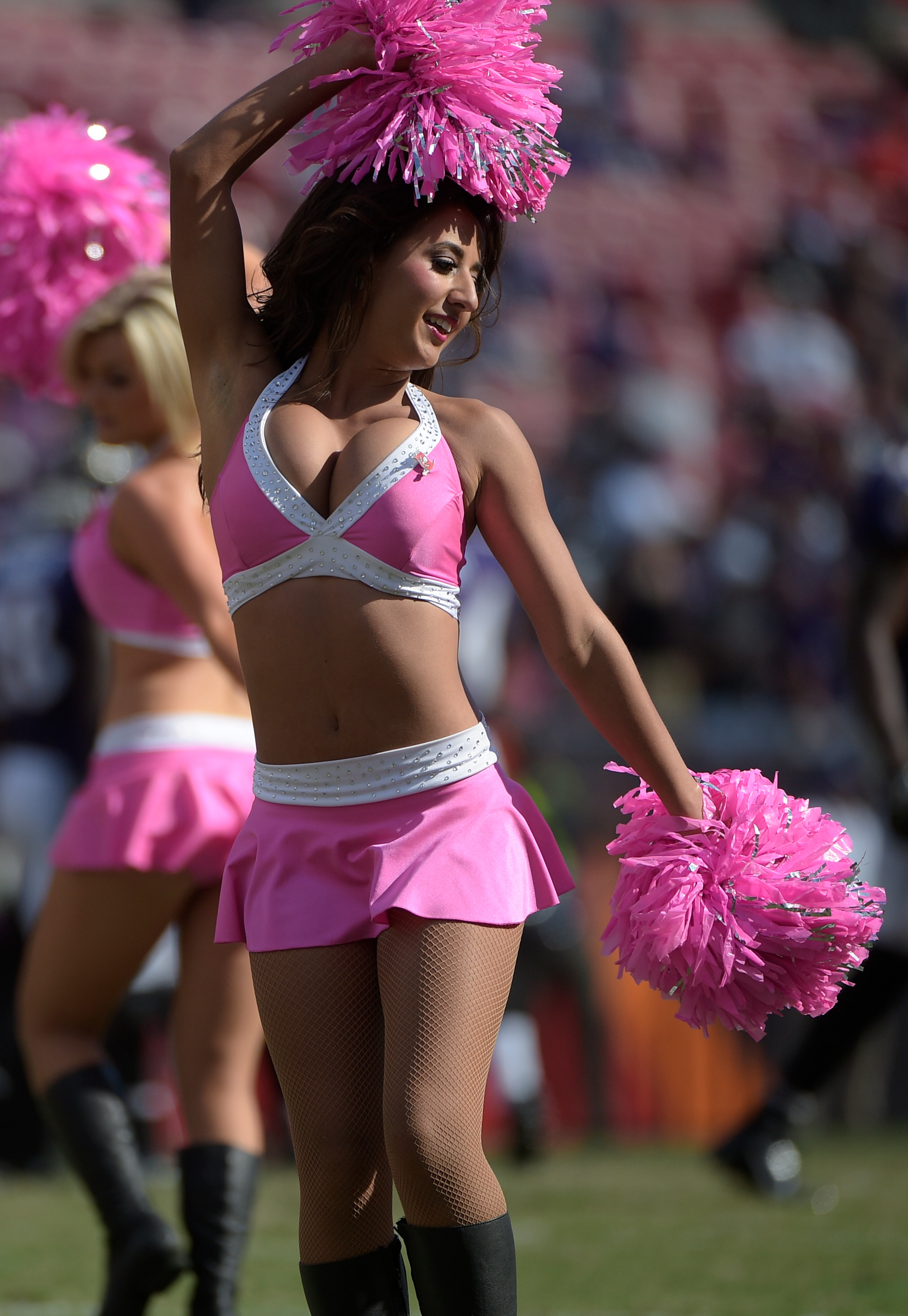 The Tampa Bay Buccaneers cheerleaders perform during the second half of an NFL football game against the Baltimore Ravens in Tampa, Fla., Sunday, Oct. 12, 2014.(AP Photo/Phelan M. Ebenhack)