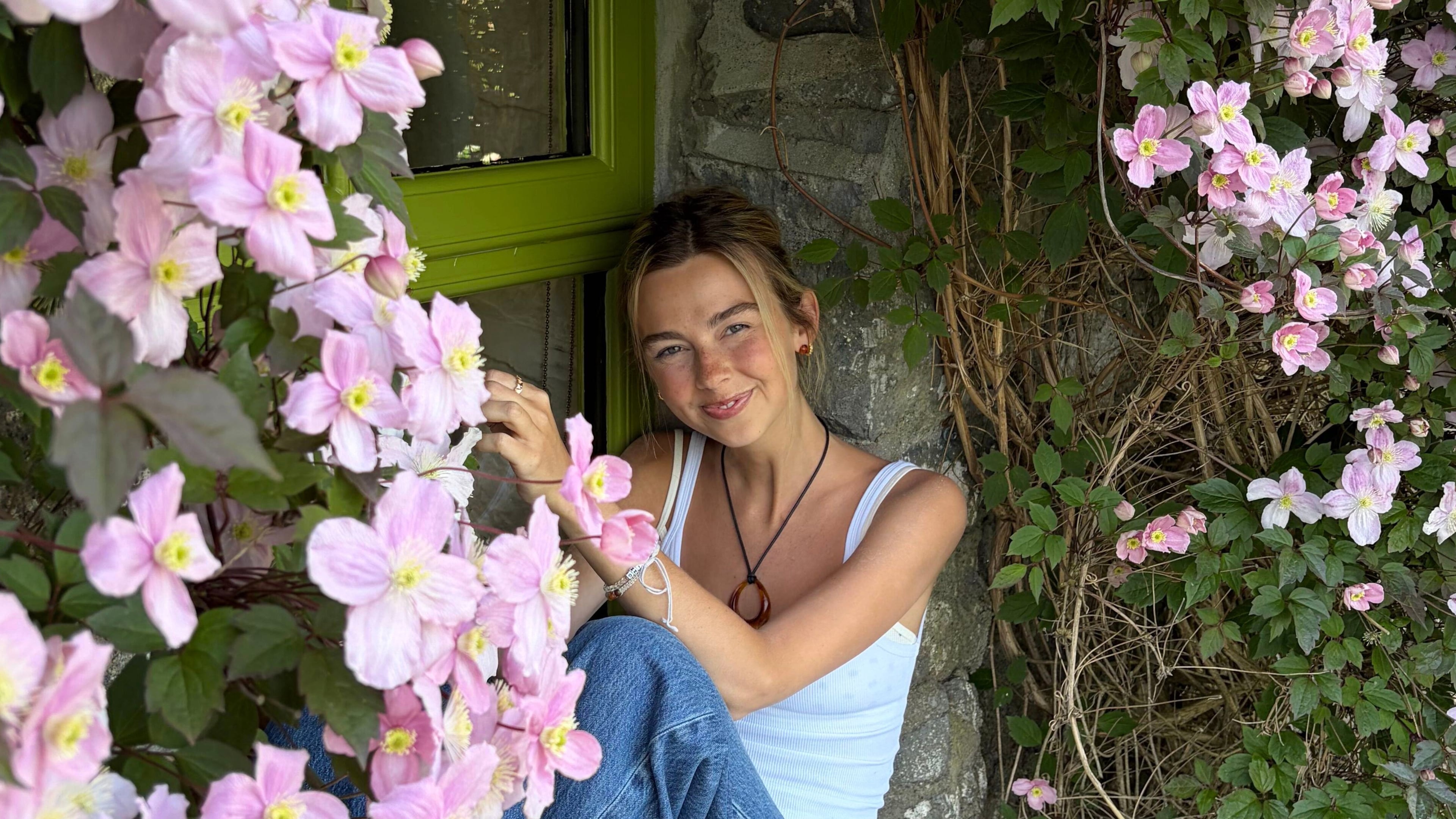 This undated photo provided by Elizabeth Morrow on Thursday, Aug. 6, 2026, shows Sydney Towle smiling for a photo. (Elizabeth Morrow via AP)