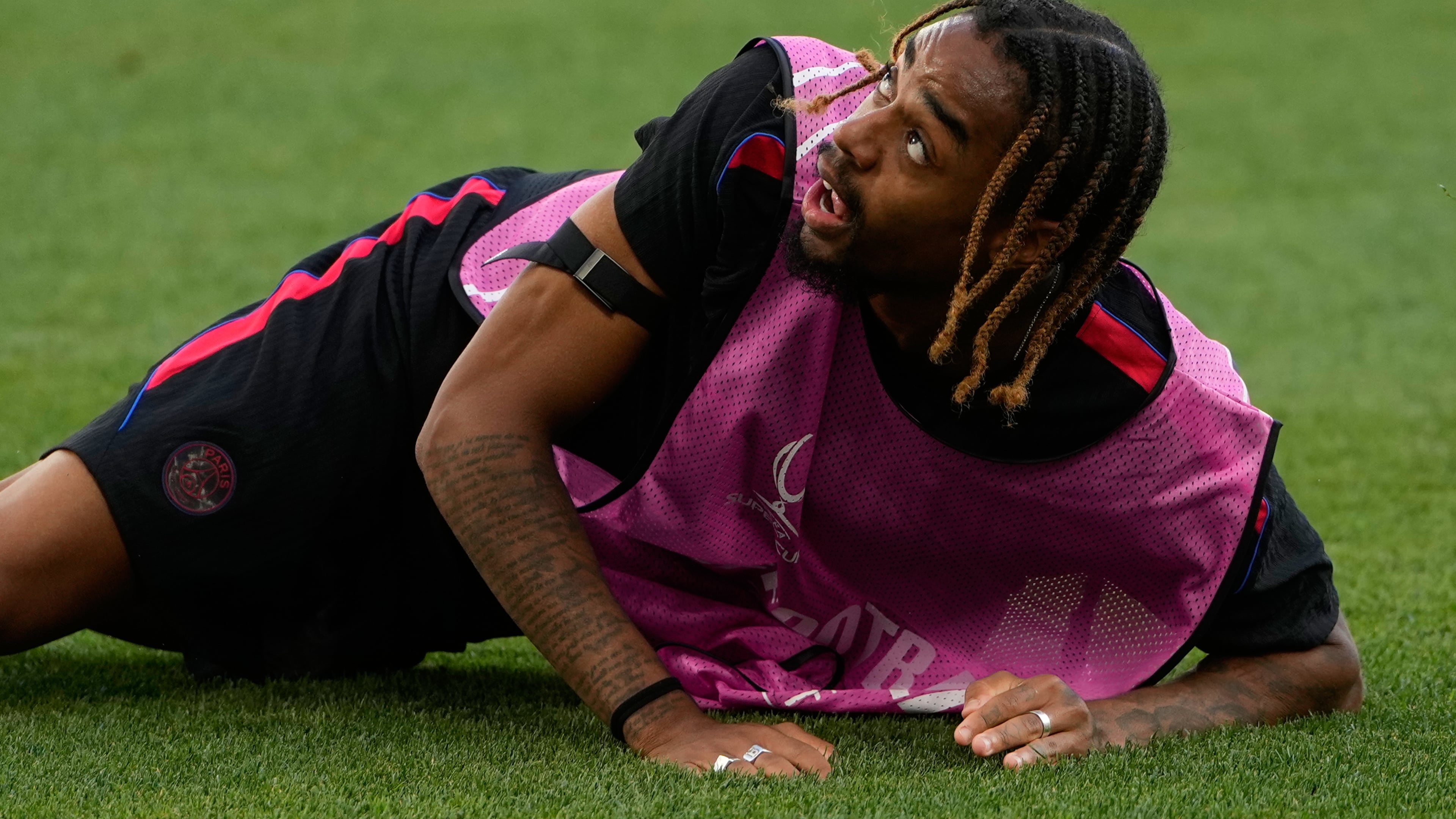 PSG's Bradley Barcola eyes the ball during a training session ahead of the UEFA Super Cup soccer match against Aston Villa in Salzburg, Austria, Tuesday, Aug. 11, 2026. (AP Photo/Darko Bandic)