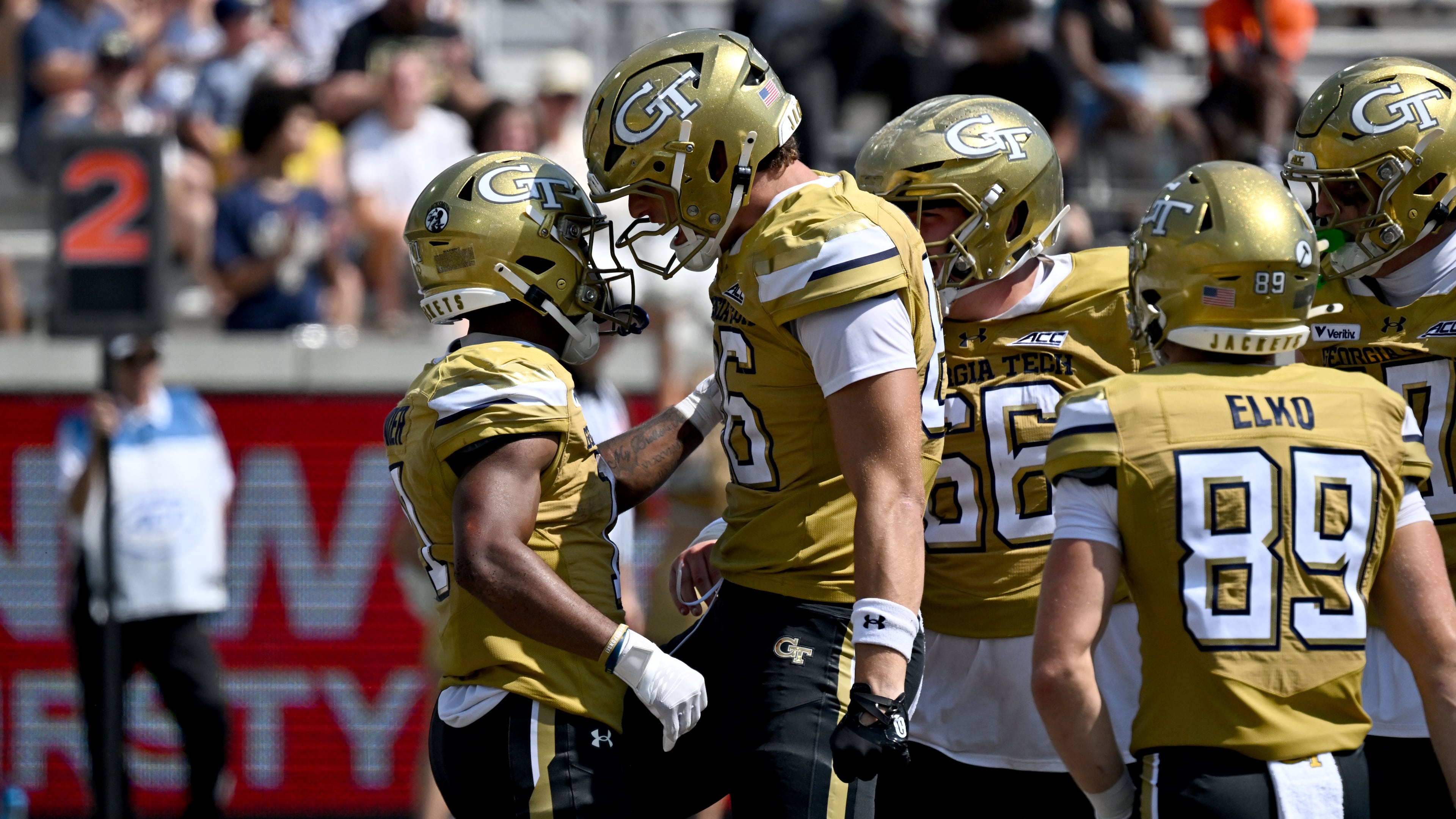 Georgia Tech running back Chad Alexander (left) celebrates after scoring against Mercer on Saturday. The Yellow Jackets ACC opener will be on the West Coast, against Stanford. (Hyosub Shin/AJC)